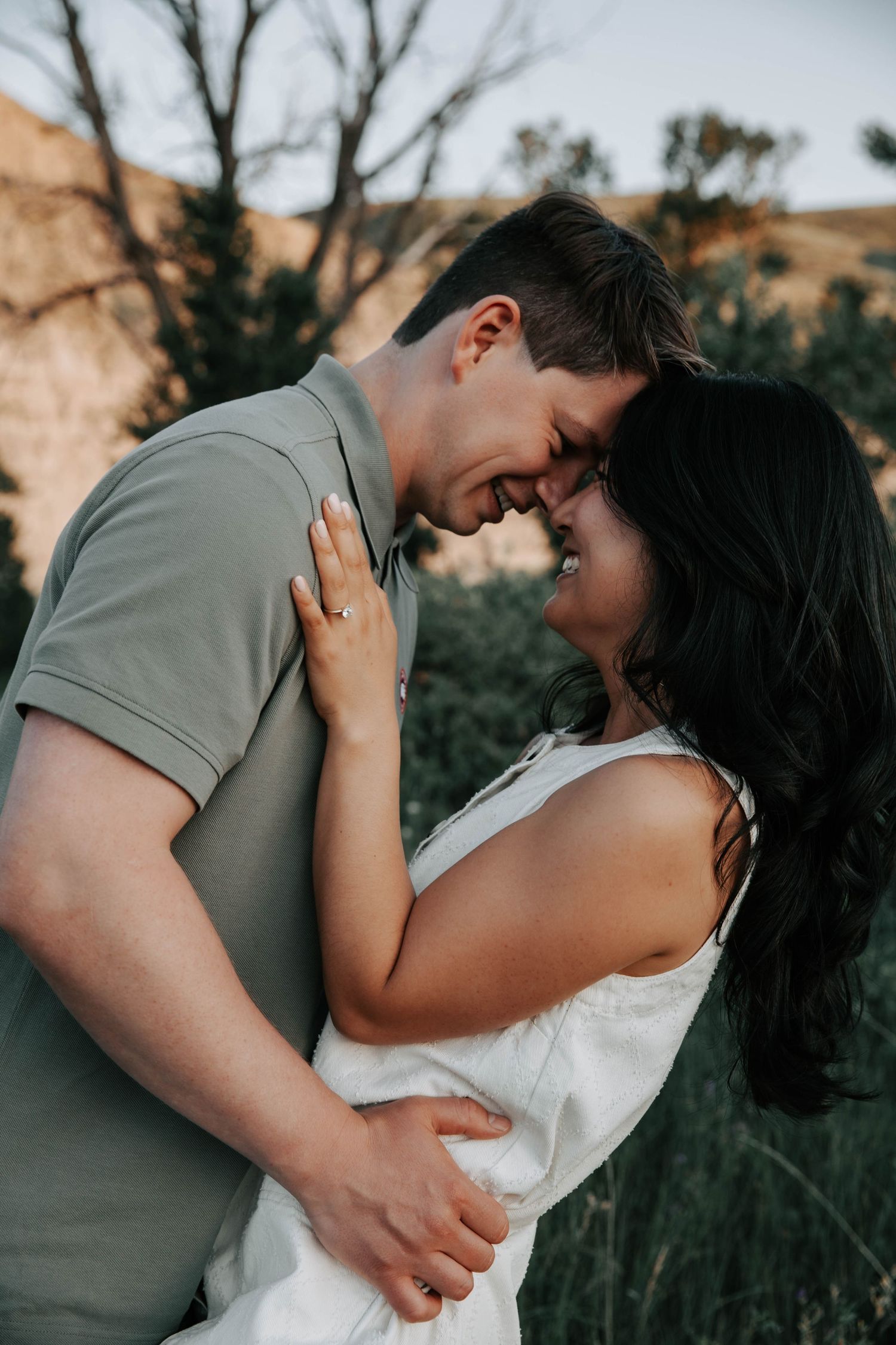 wedding and engagement photographers in lethbridge alberta - couples engagement session shot in west lethbridge at popson park alberta