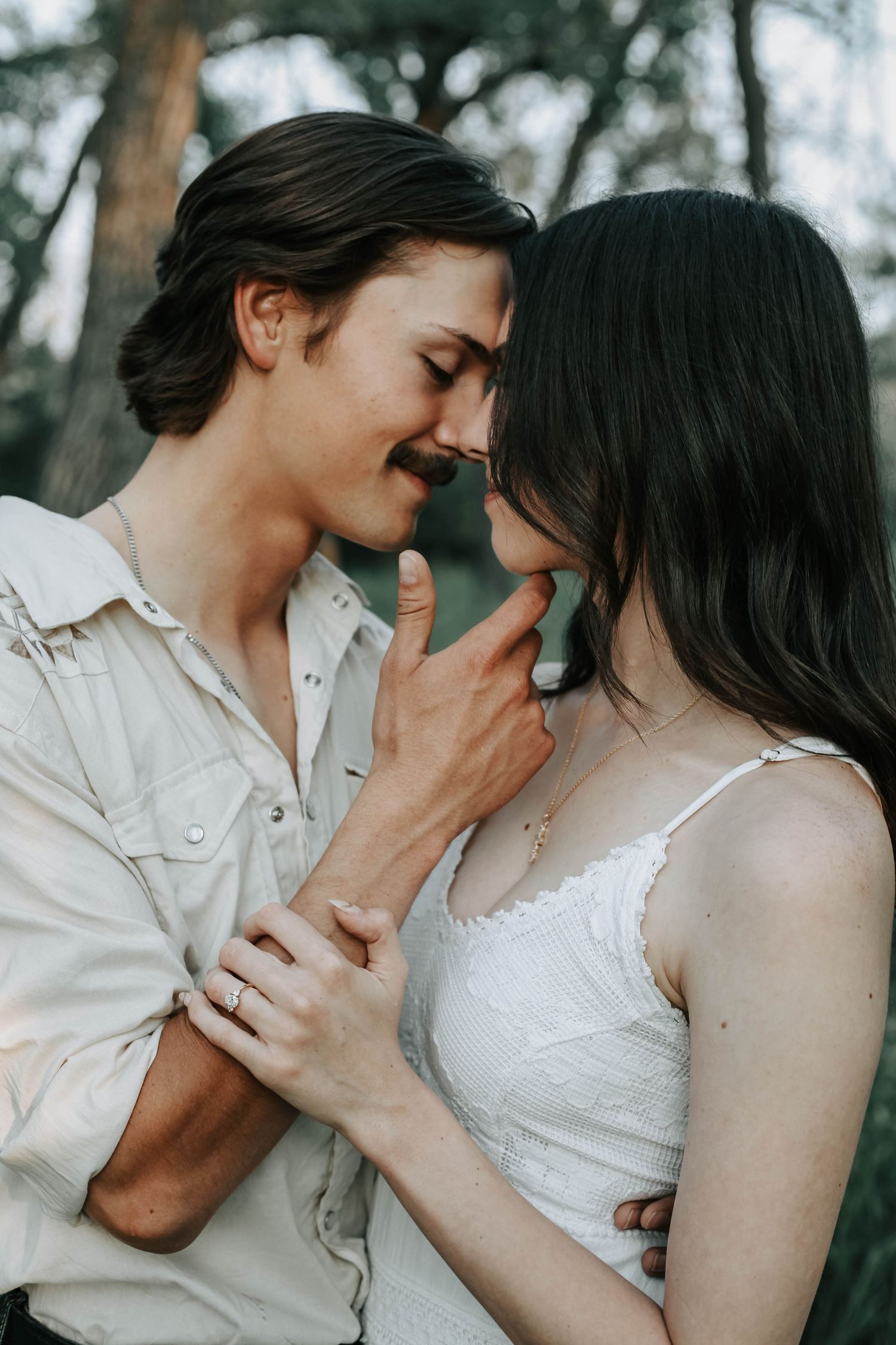 couples photographer taking engagement photos in lethbridge alberta with an engaged couple - complimentary engagement sessions with booking