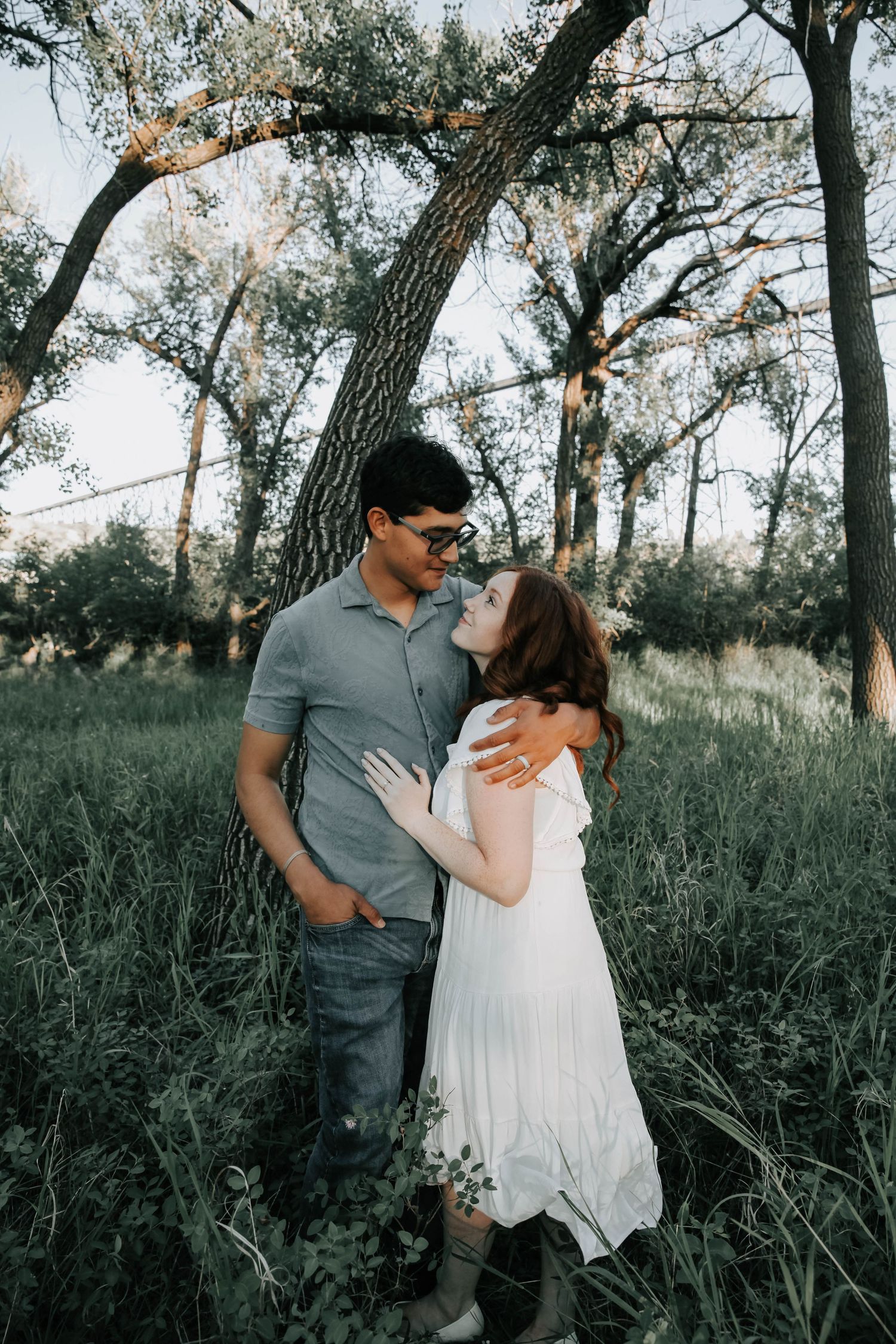 couples photographer taking engagement photos in lethbridge alberta with an engaged couple - complimentary engagement sessions with booking