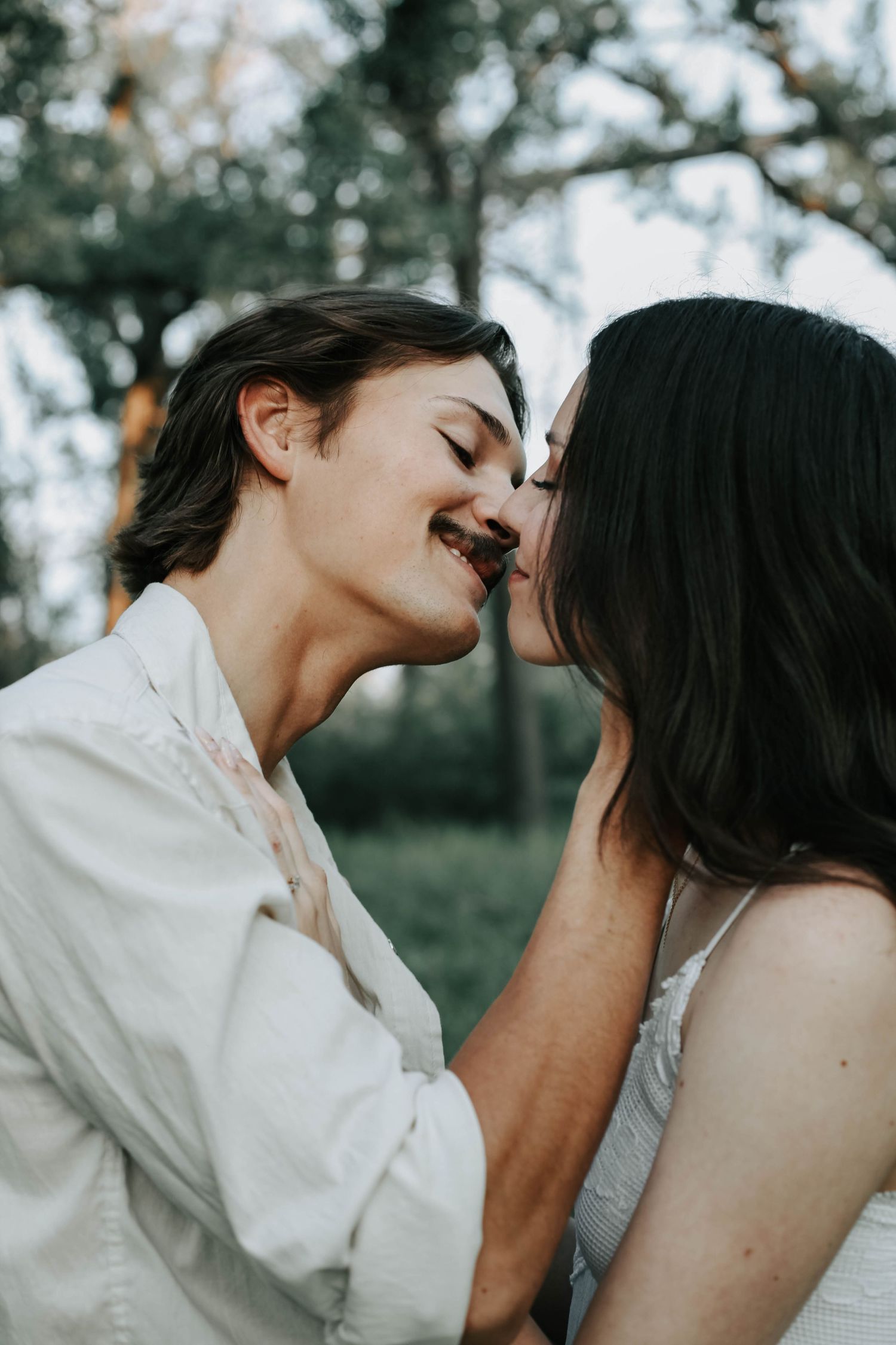 an engaged couple getting engagement photos in lethbridge alberta with engagement and wedding photographer allie cooke photography