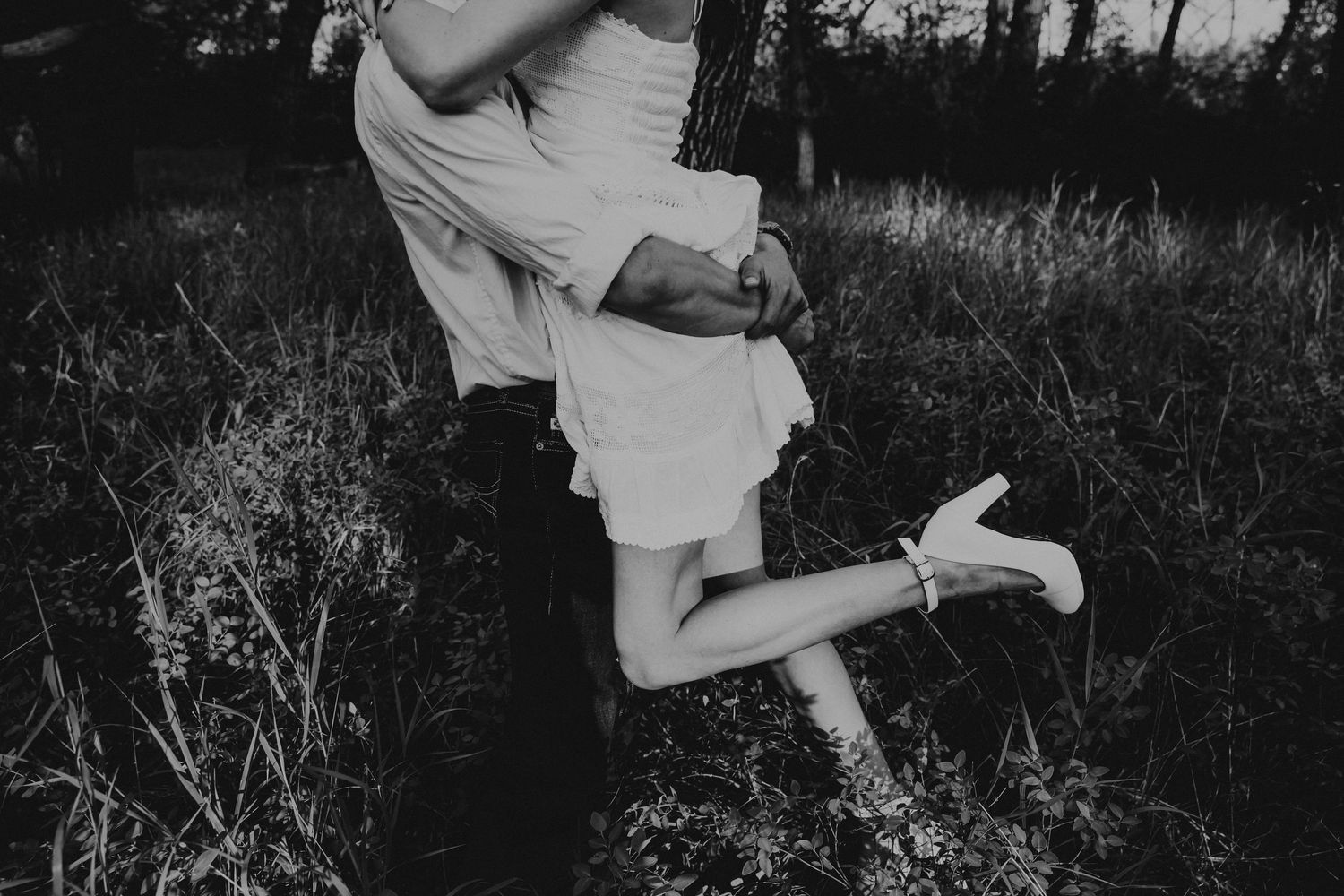 couples photographer taking engagement photos in lethbridge alberta with an engaged couple - complimentary engagement sessions with booking