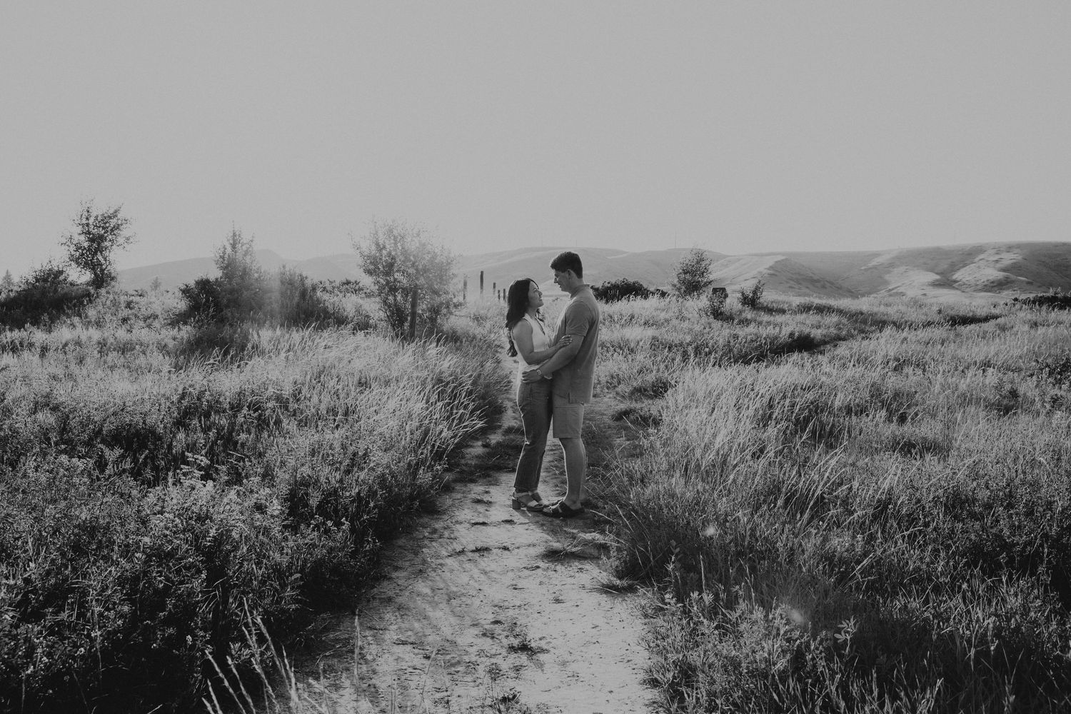 wedding and engagement photographers in lethbridge alberta - couples engagement session shot in west lethbridge at popson park alberta