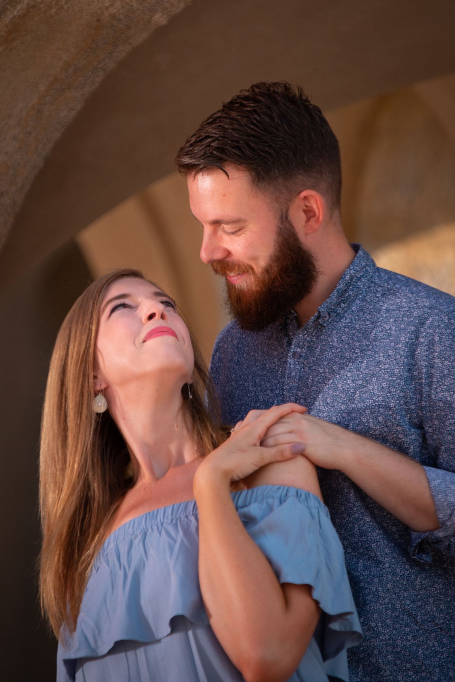 A couple enjoying their engagement photo session taken in Prague, Czech Republic.