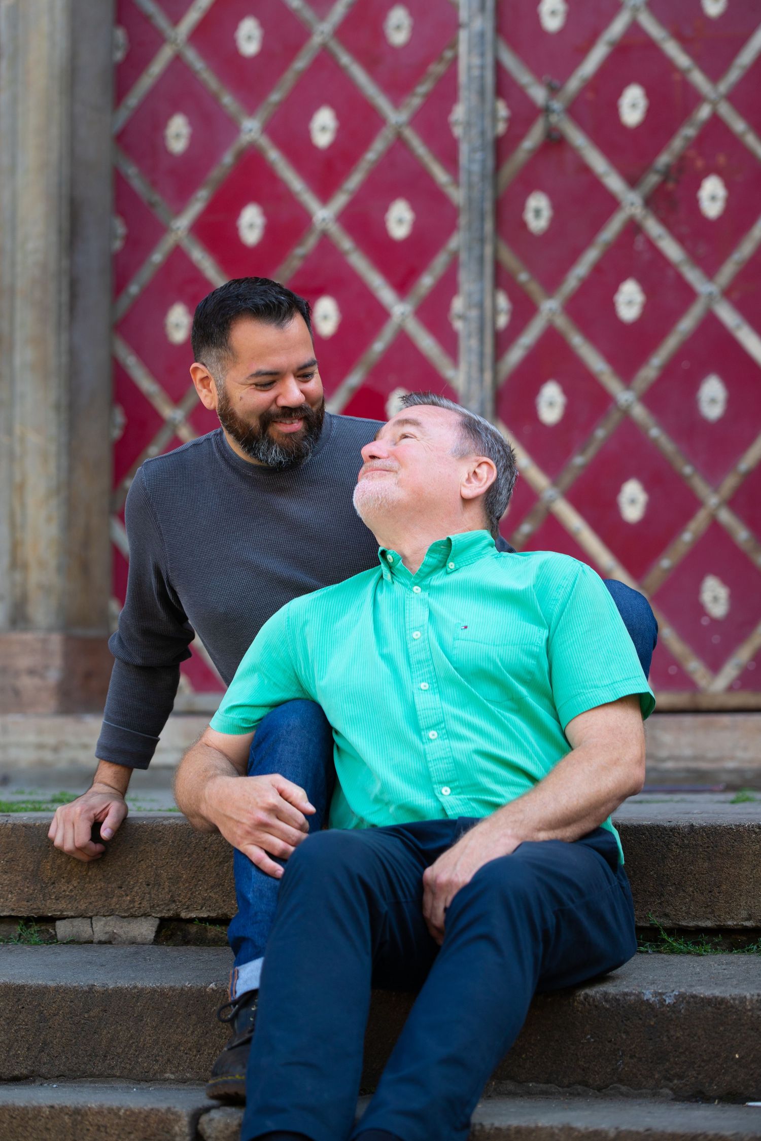 A couple enjoying each other during a photo session in Prague, Czech Republic.