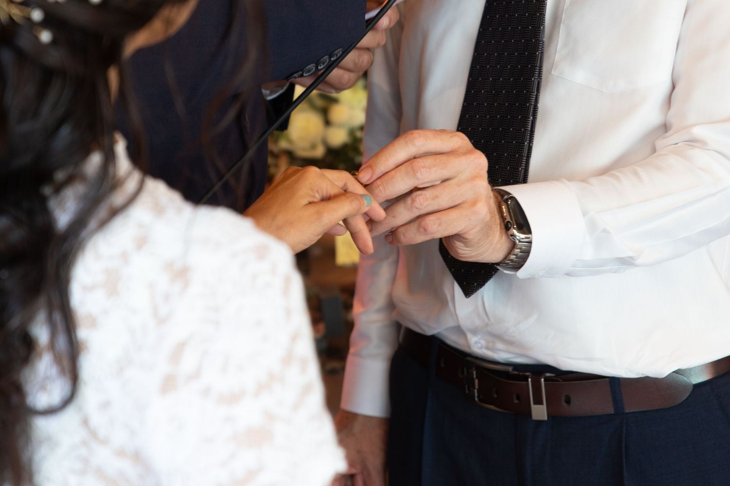 A couple exchanging rings at their destination wedding on Koh Samui, Thailand.