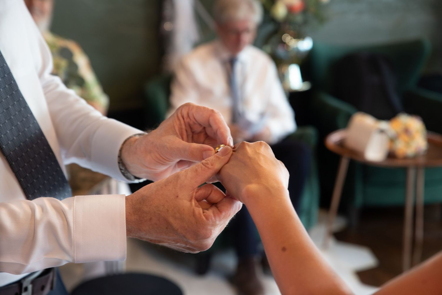 A couple exchanging rings at their destination wedding on Koh Samui, Thailand.