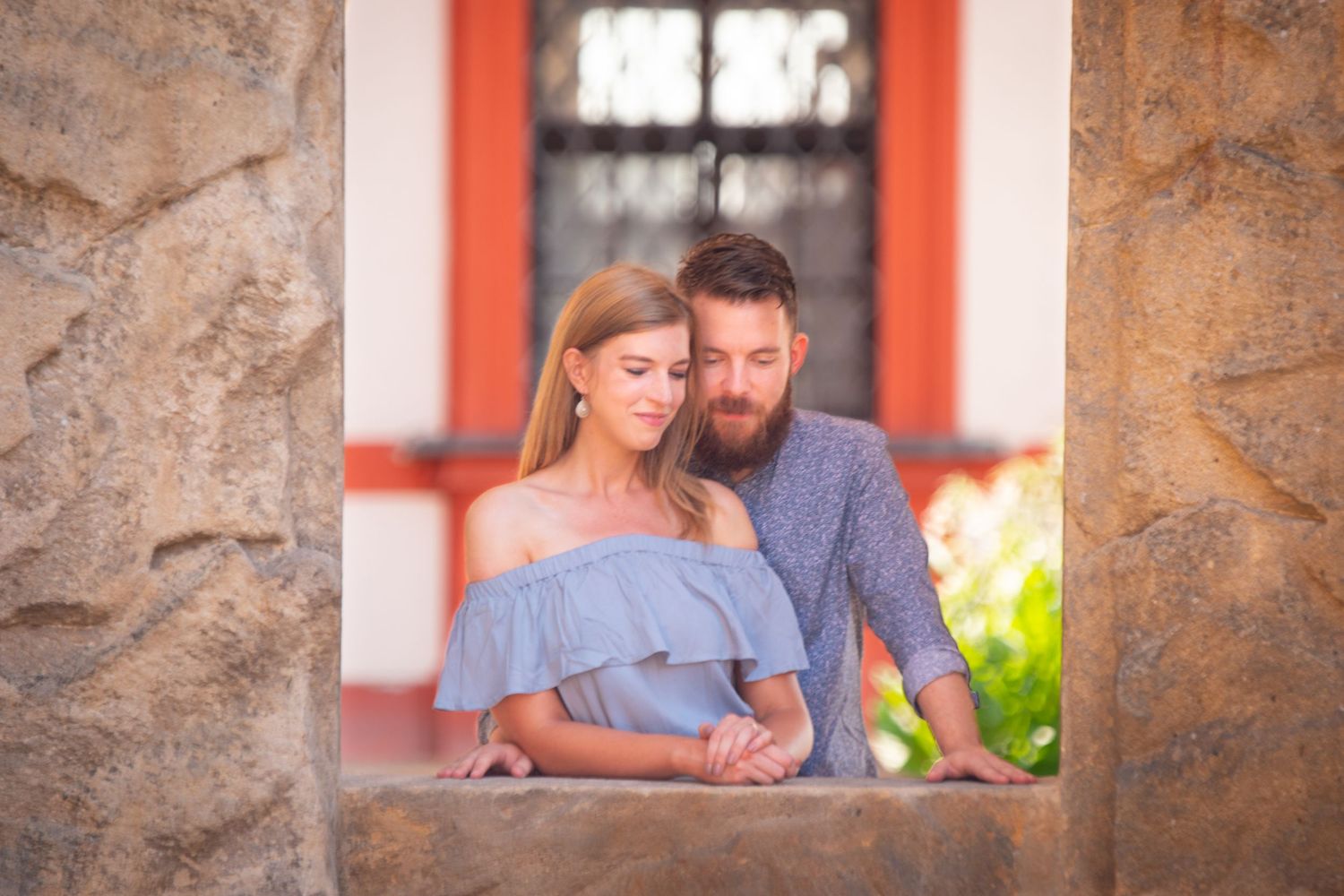 A couple enjoying their engagement photo session taken in Prague, Czech Republic.