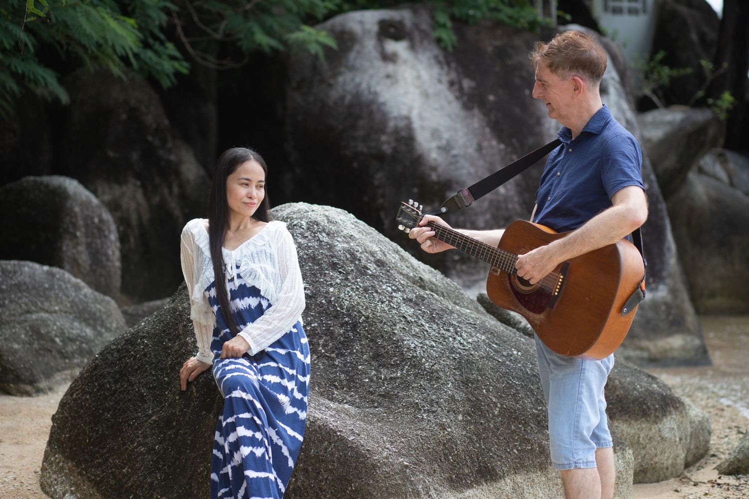 A couple enjoying their engagement photo session taken on the beaches of Koh Samui, Thailand.