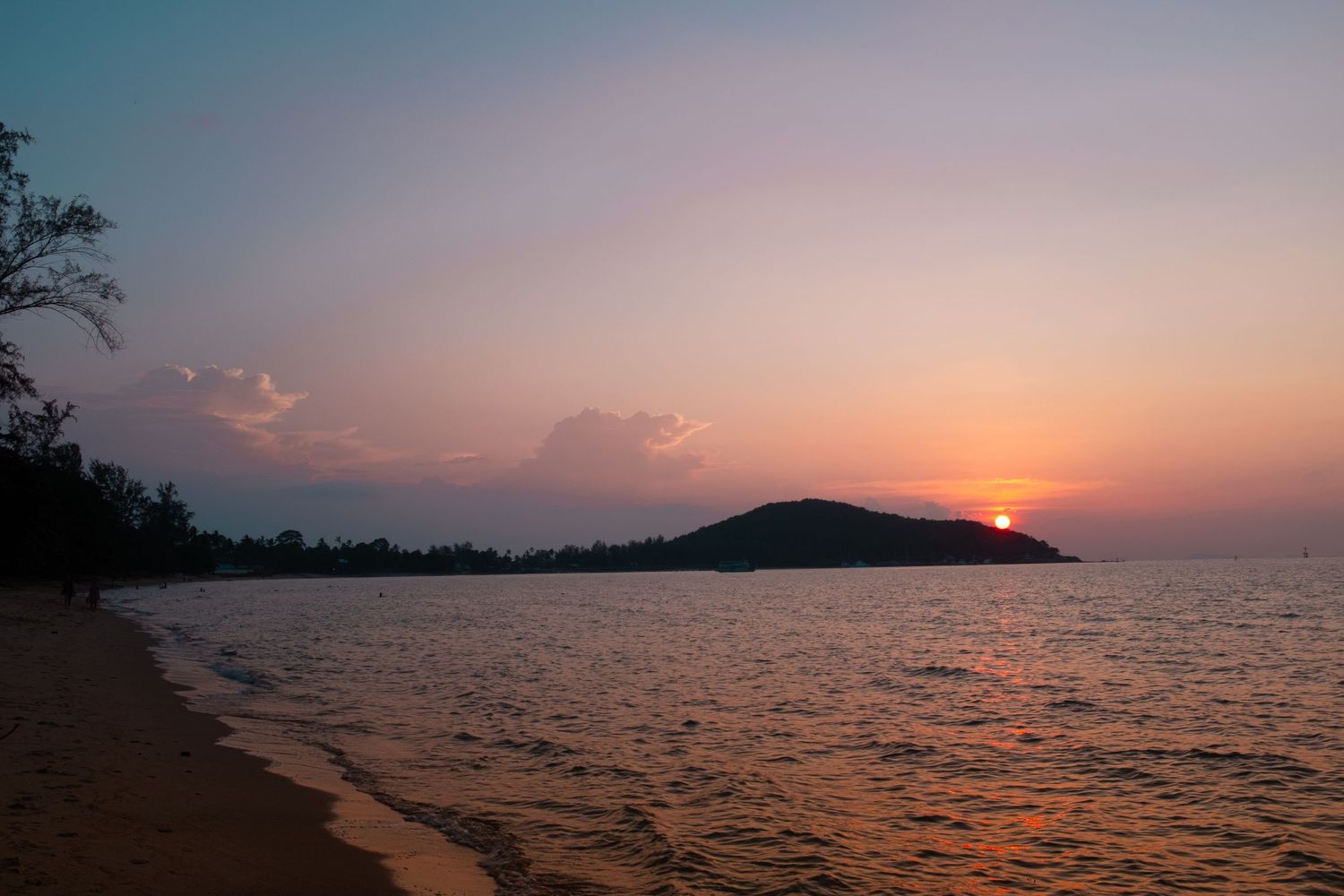 A sunset photo at a beach on the south end of Koh Samui, Thailand.