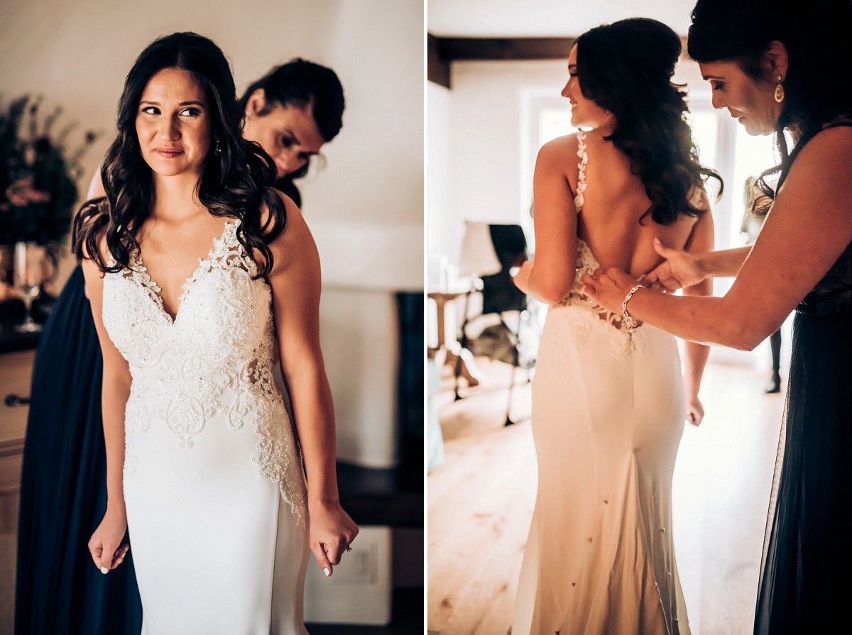 Wedding dress fitting session showing intricate lace details and form-fitting silhouette.