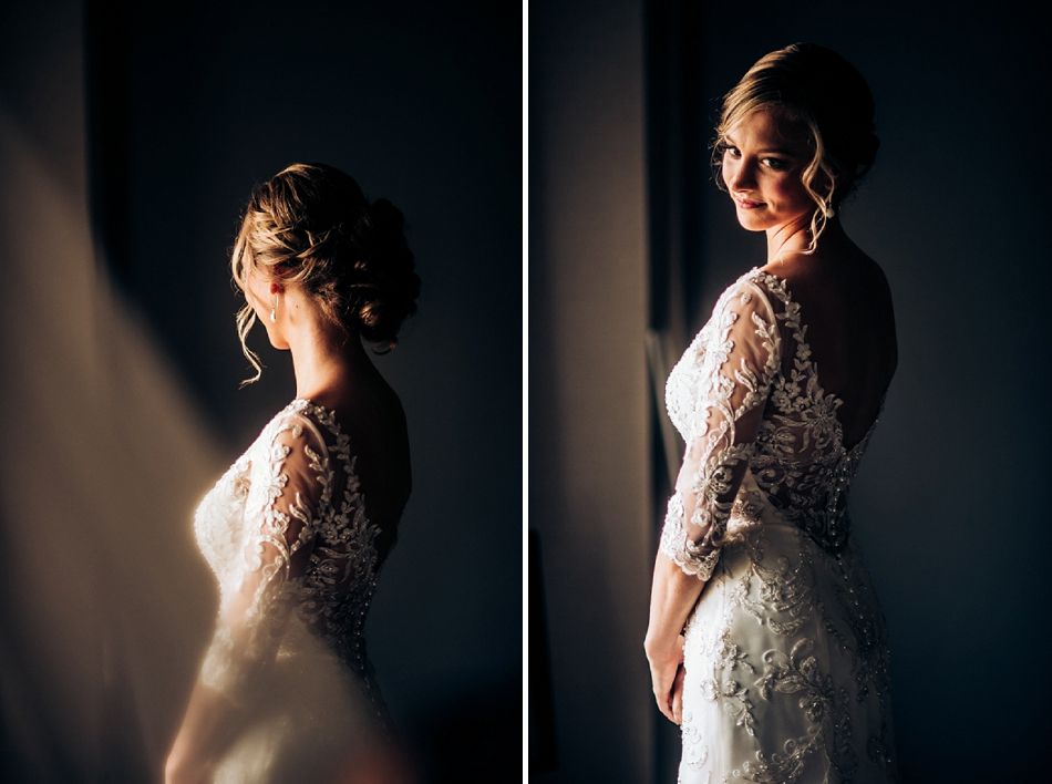 Dramatic side-lit portraits of a wedding dress with intricate lace details and three-quarter sleeves.