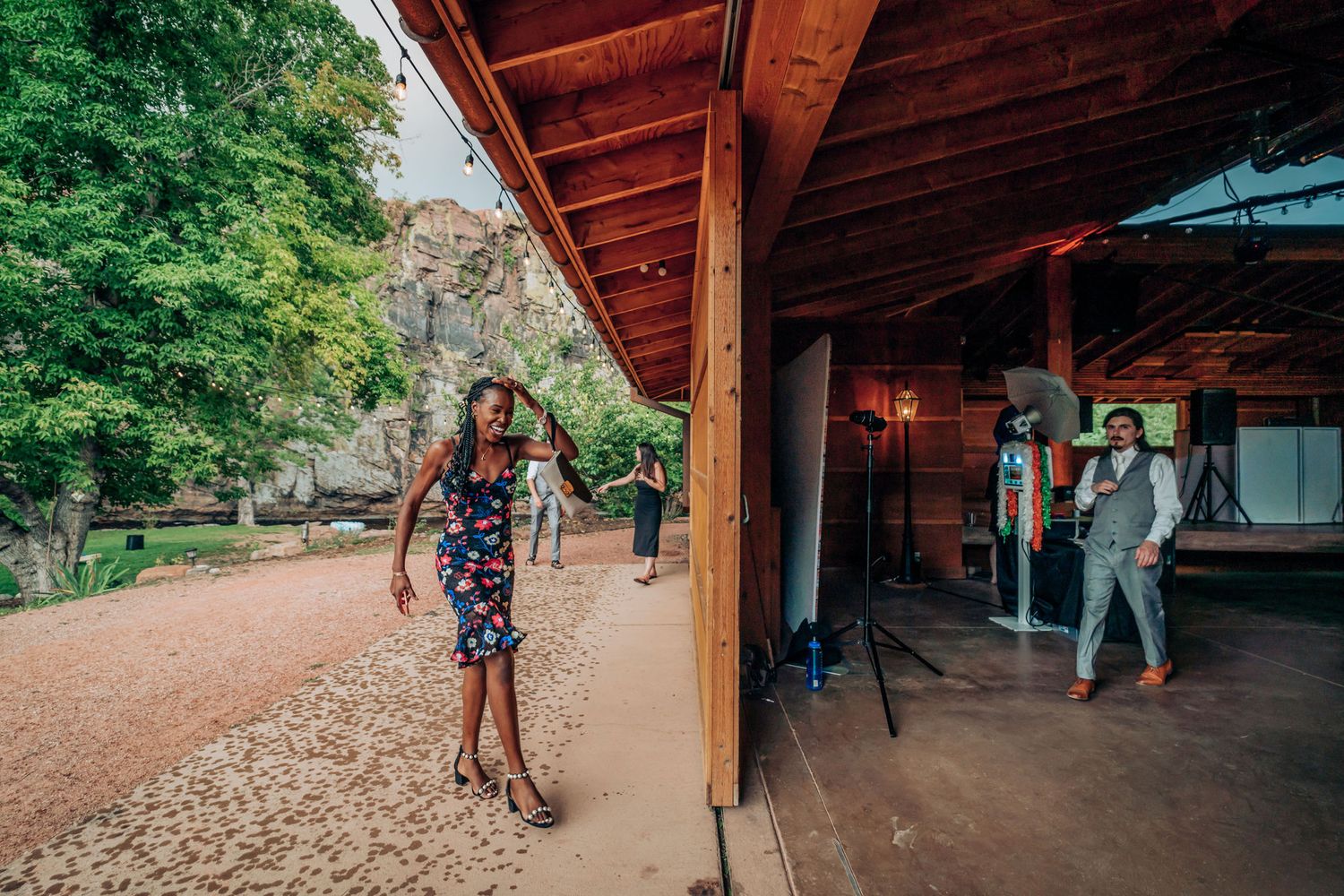 Wedding venue exterior showing a covered porch area with natural surroundings.