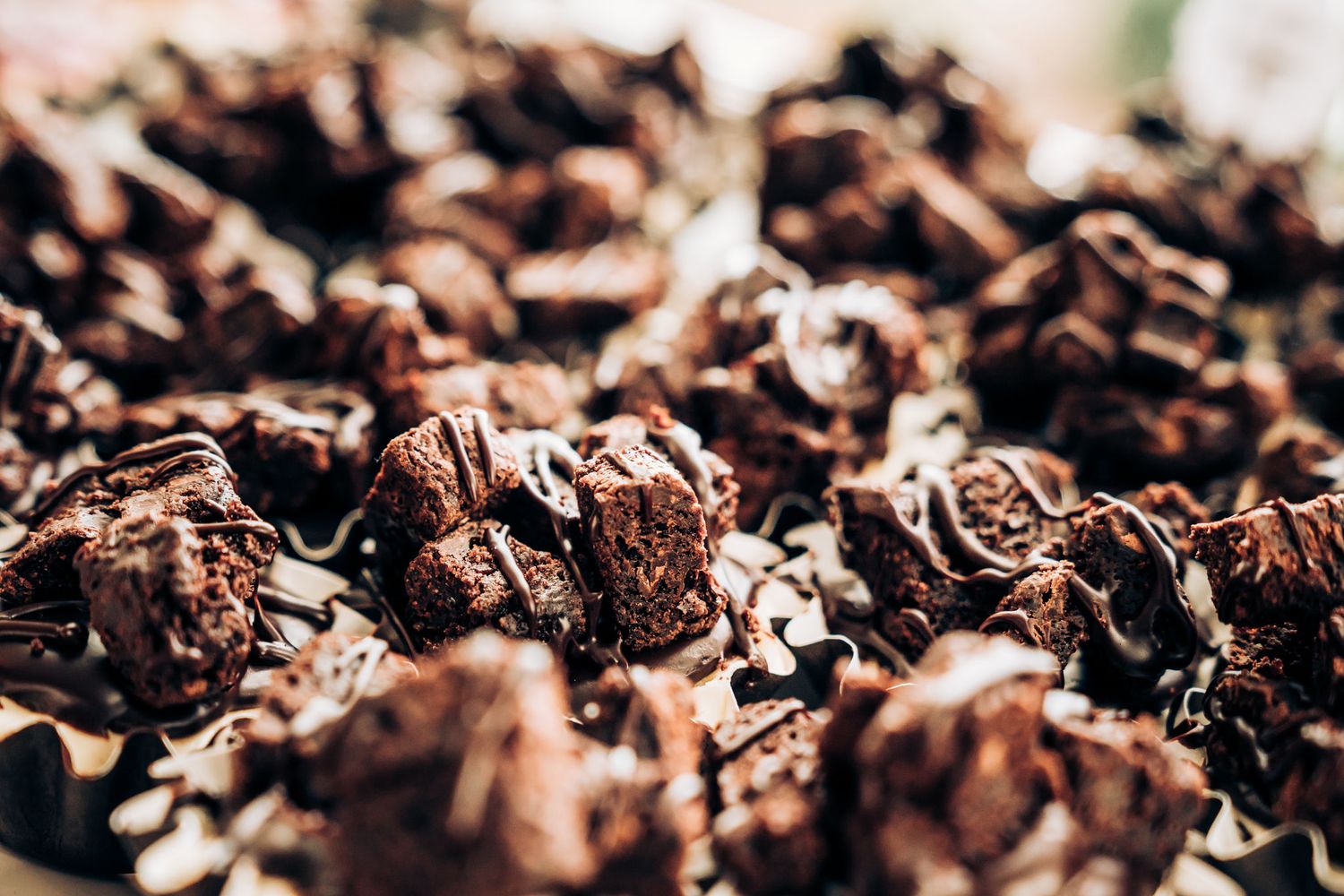 Close-up macro shot of chocolate dessert pieces with textured details.