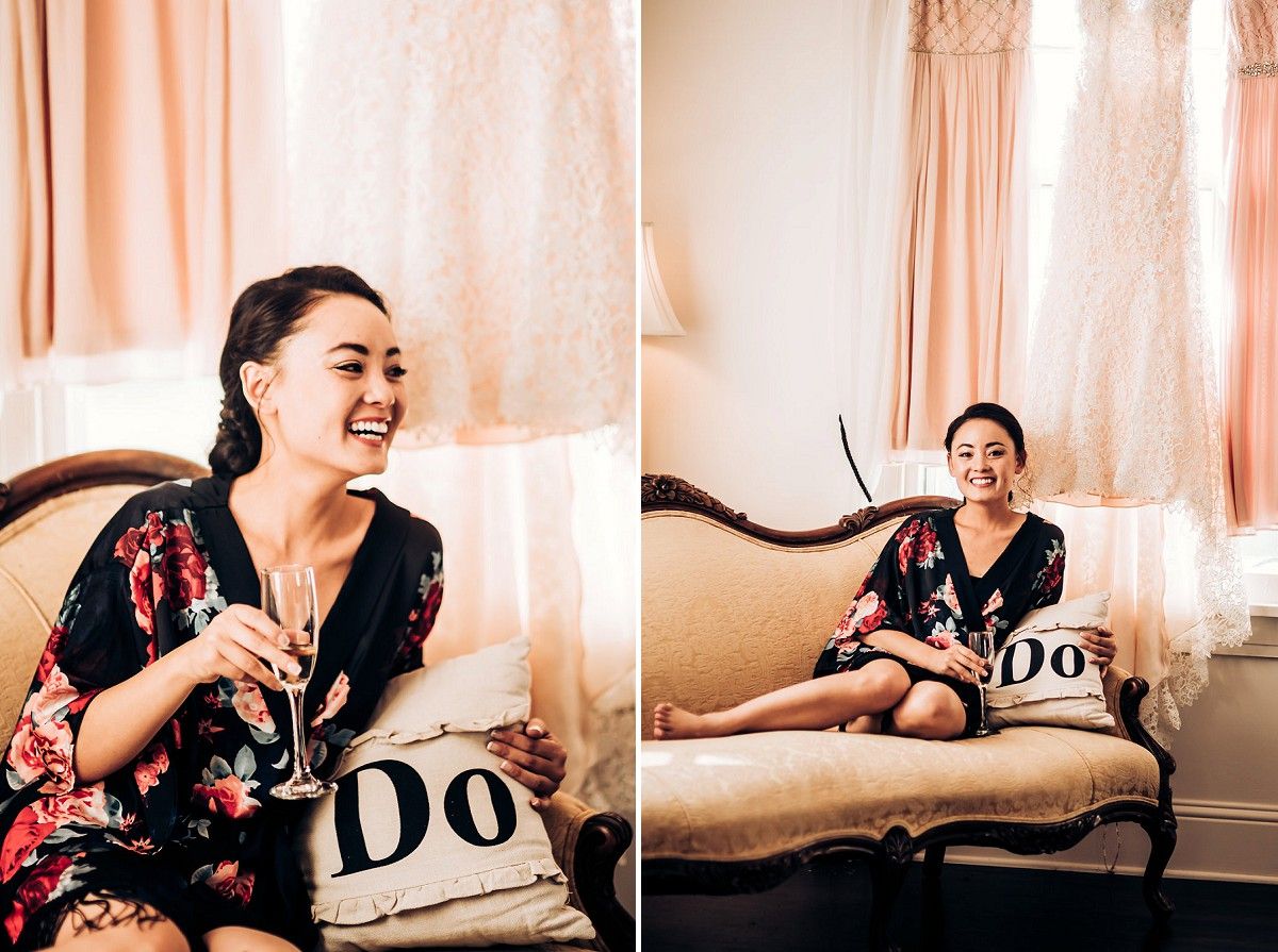 Relaxed pre-wedding moments captured on an elegant vintage sofa with soft pink decor.
