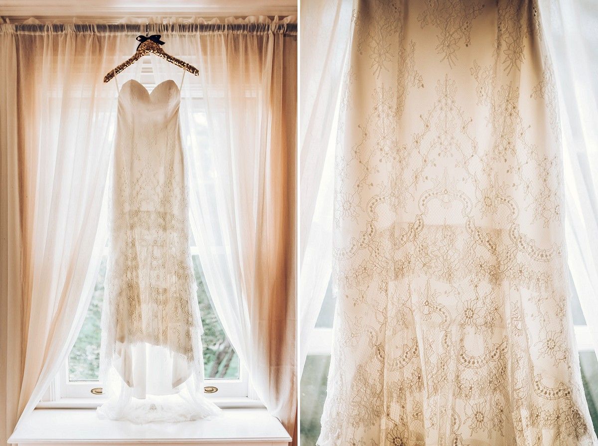 Two views of a lace wedding dress hanging in front of sheer curtained windows.
