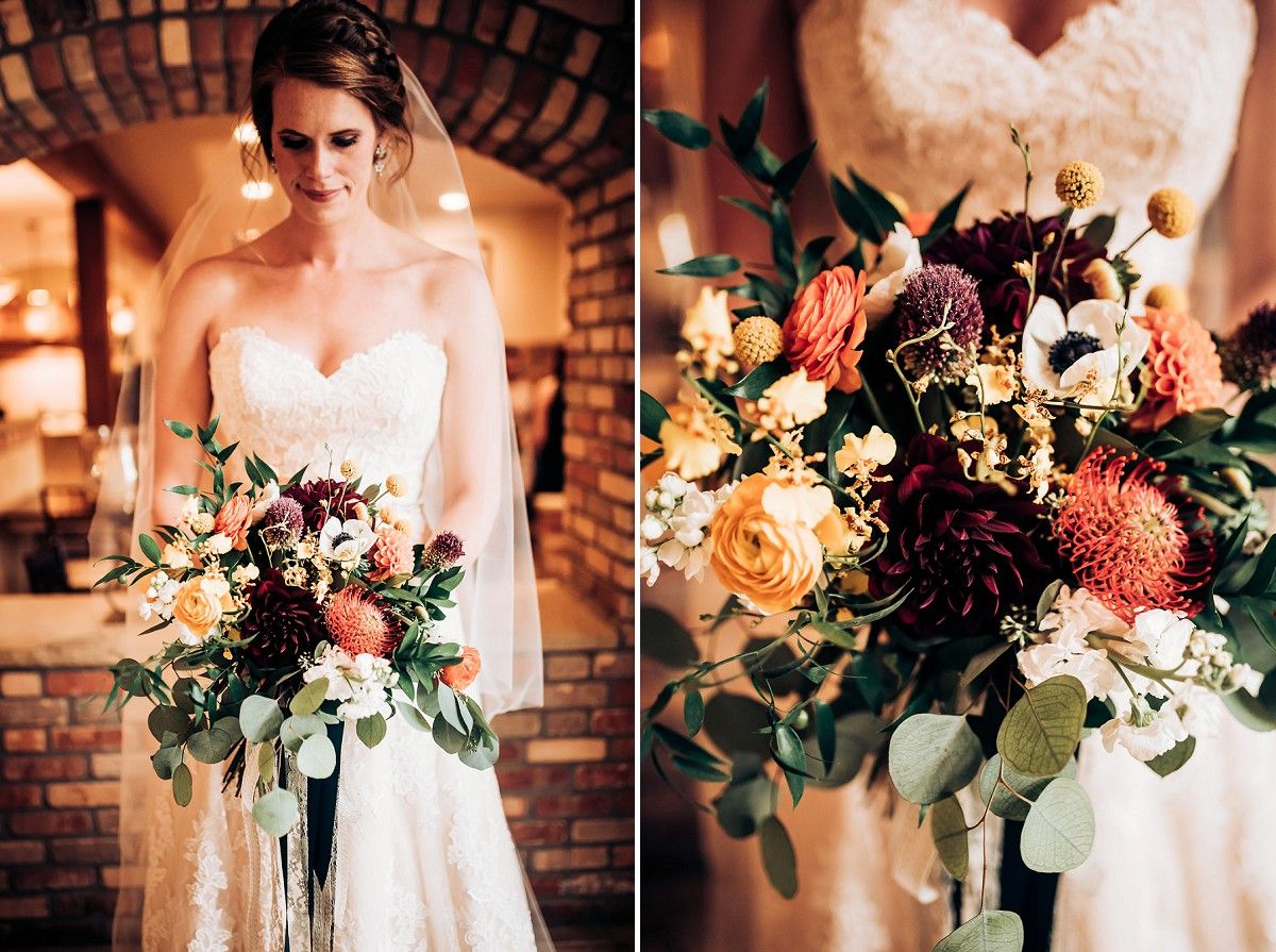Wedding dress and bouquet detail shot featuring peach and burgundy flowers with eucalyptus.