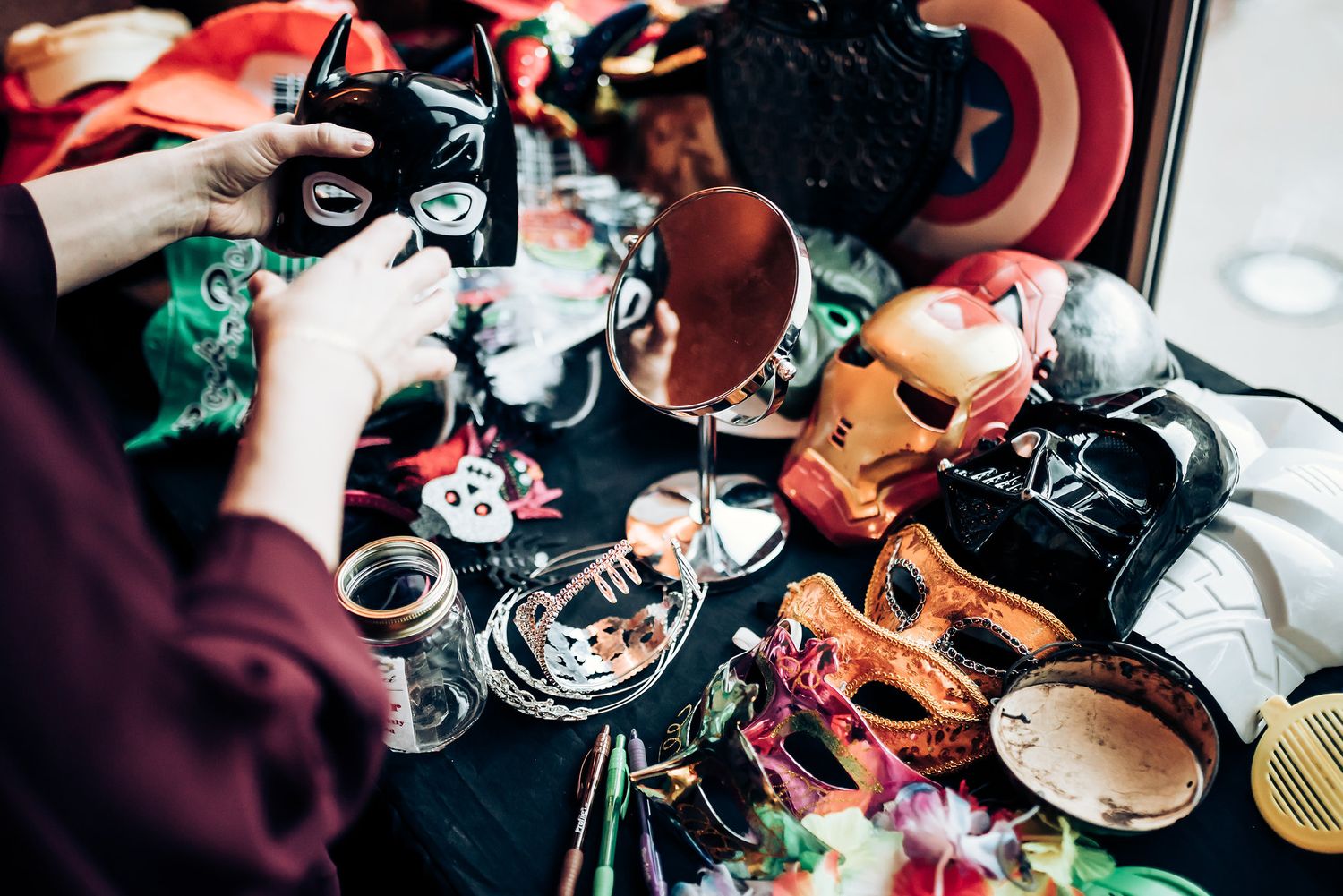 Overhead view of coffee and desserts being served at a social gathering.