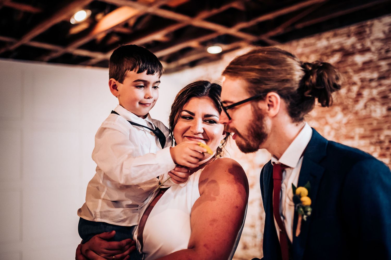 Joyful candid moment during wedding celebration.