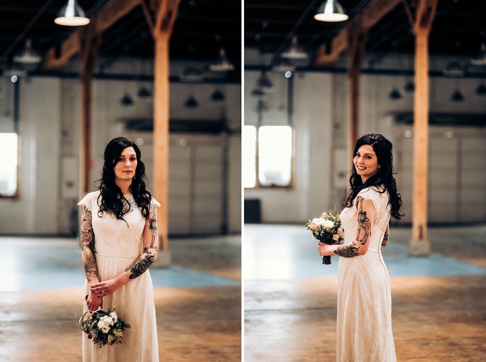Elegant bridal portraits in industrial venue with natural lighting.