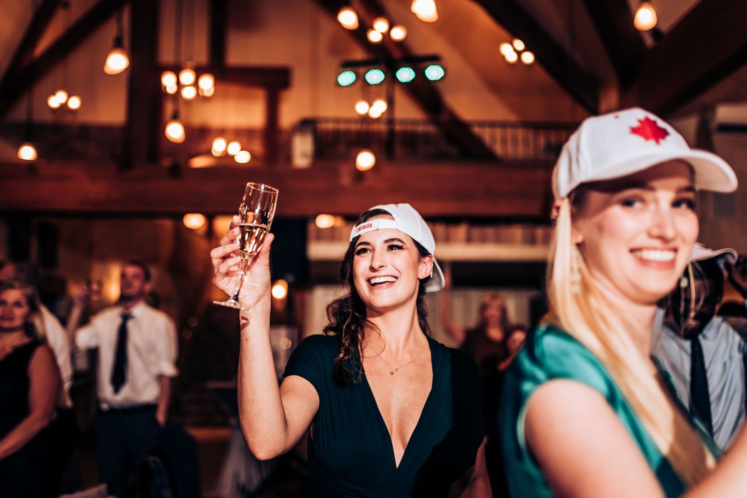 Wedding reception party scene with festive atmosphere and warm lighting.