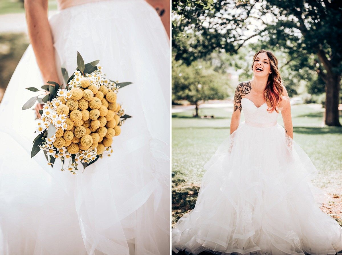 A white bridal gown billows in the sunlight as a unique yellow flower bouquet is displayed.