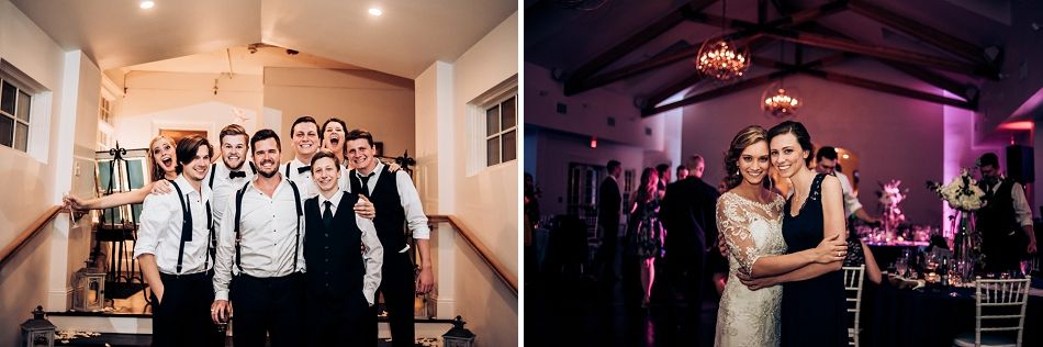 Wedding reception dance floor scene with couple surrounded by guests and ambient lighting.