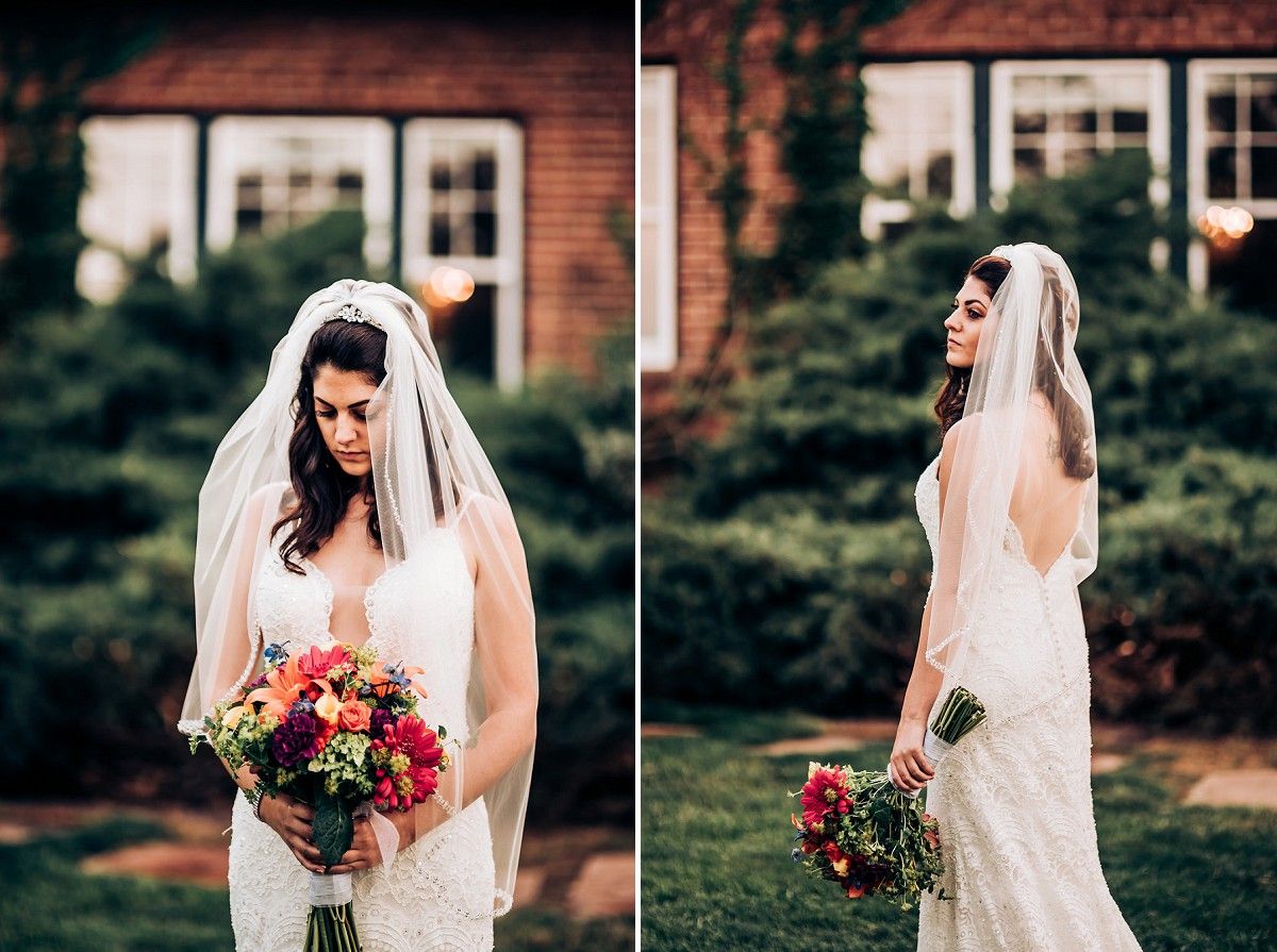 Two angles of a bride in a fitted lace gown holding a colorful bouquet against a brick building backdrop.