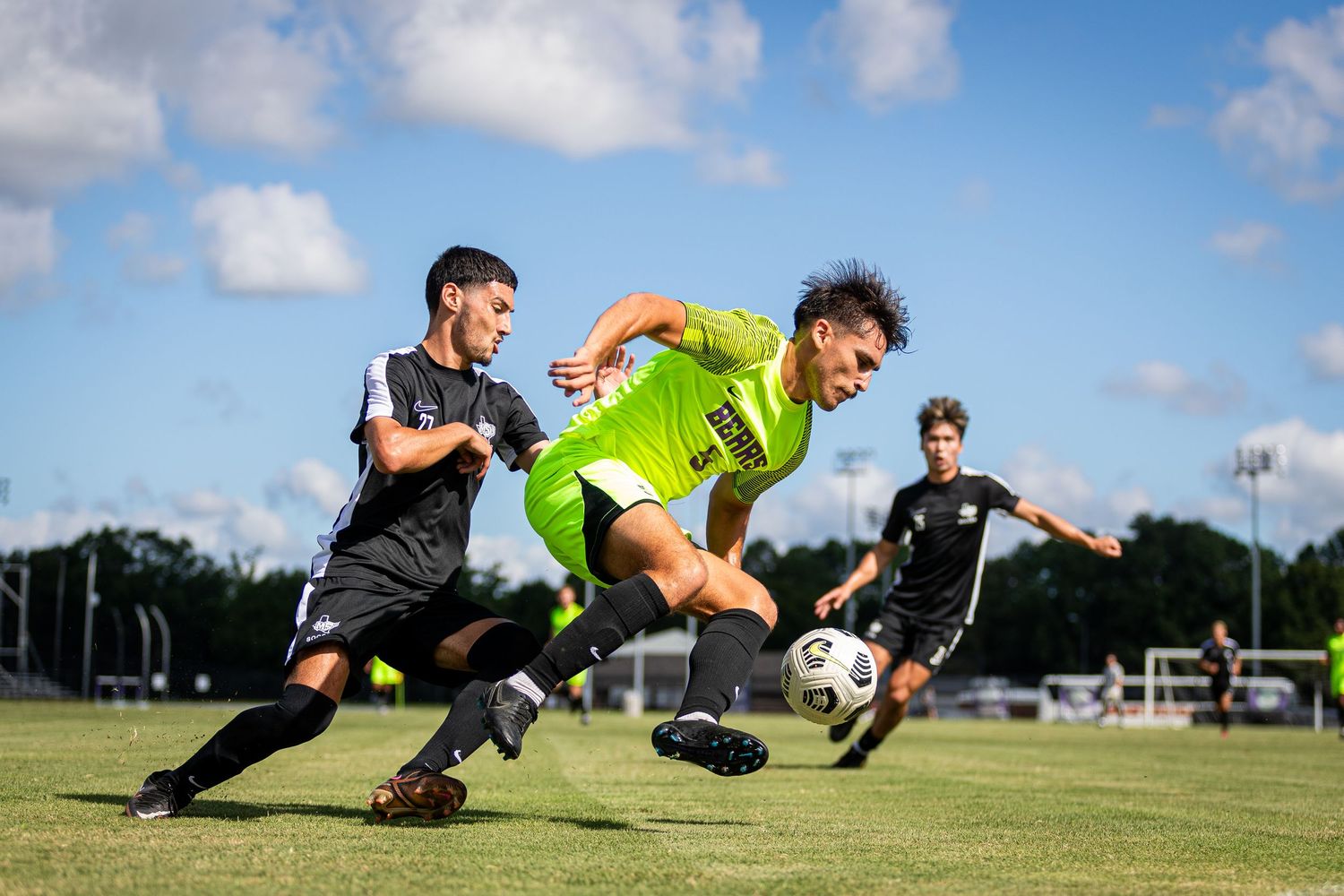 Soccer goalkeepers dive and stretch to make dramatic saves during practice drills.