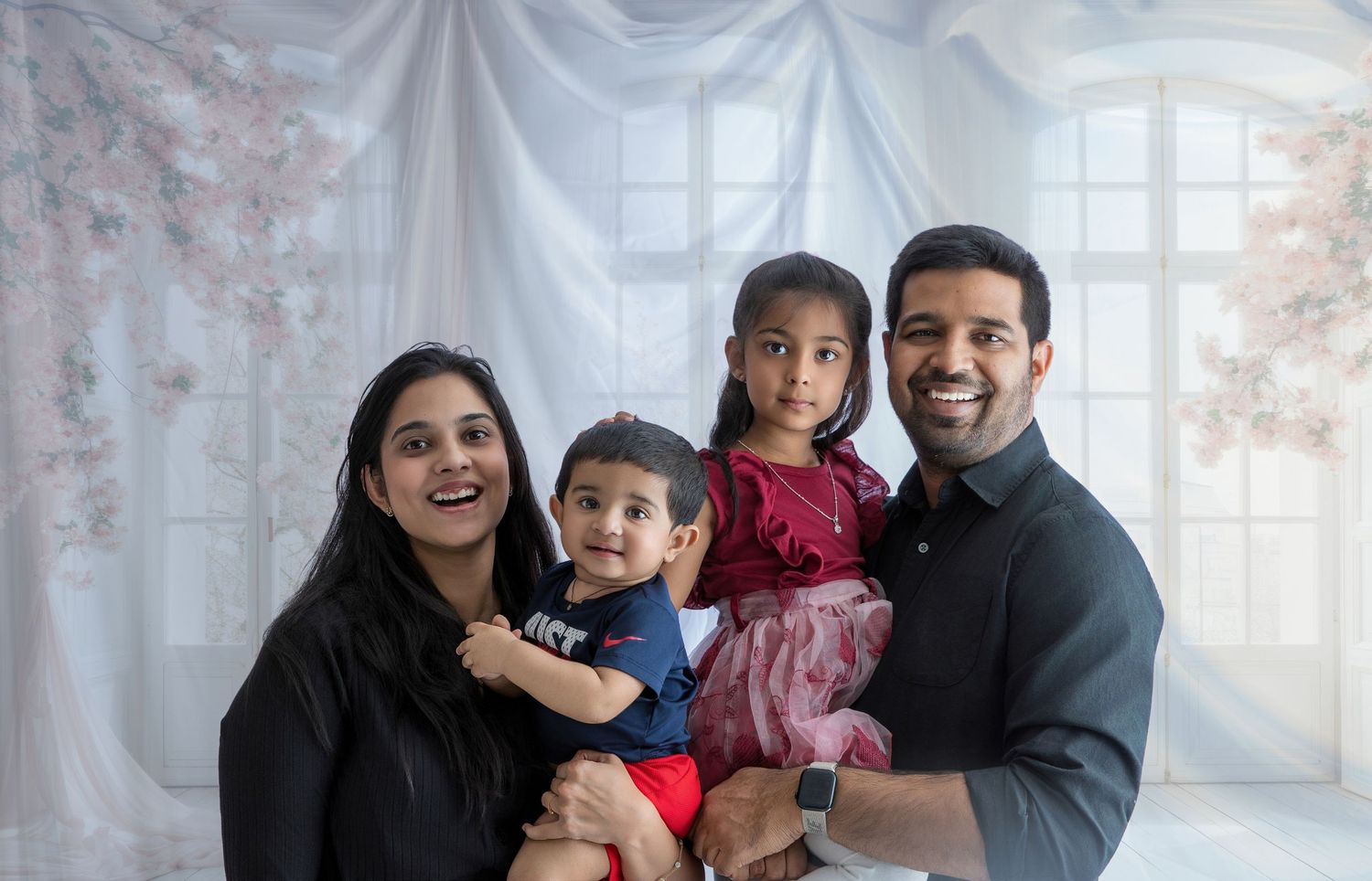 A series of family portrait photos showing parents and children posing together against a floral backdrop.