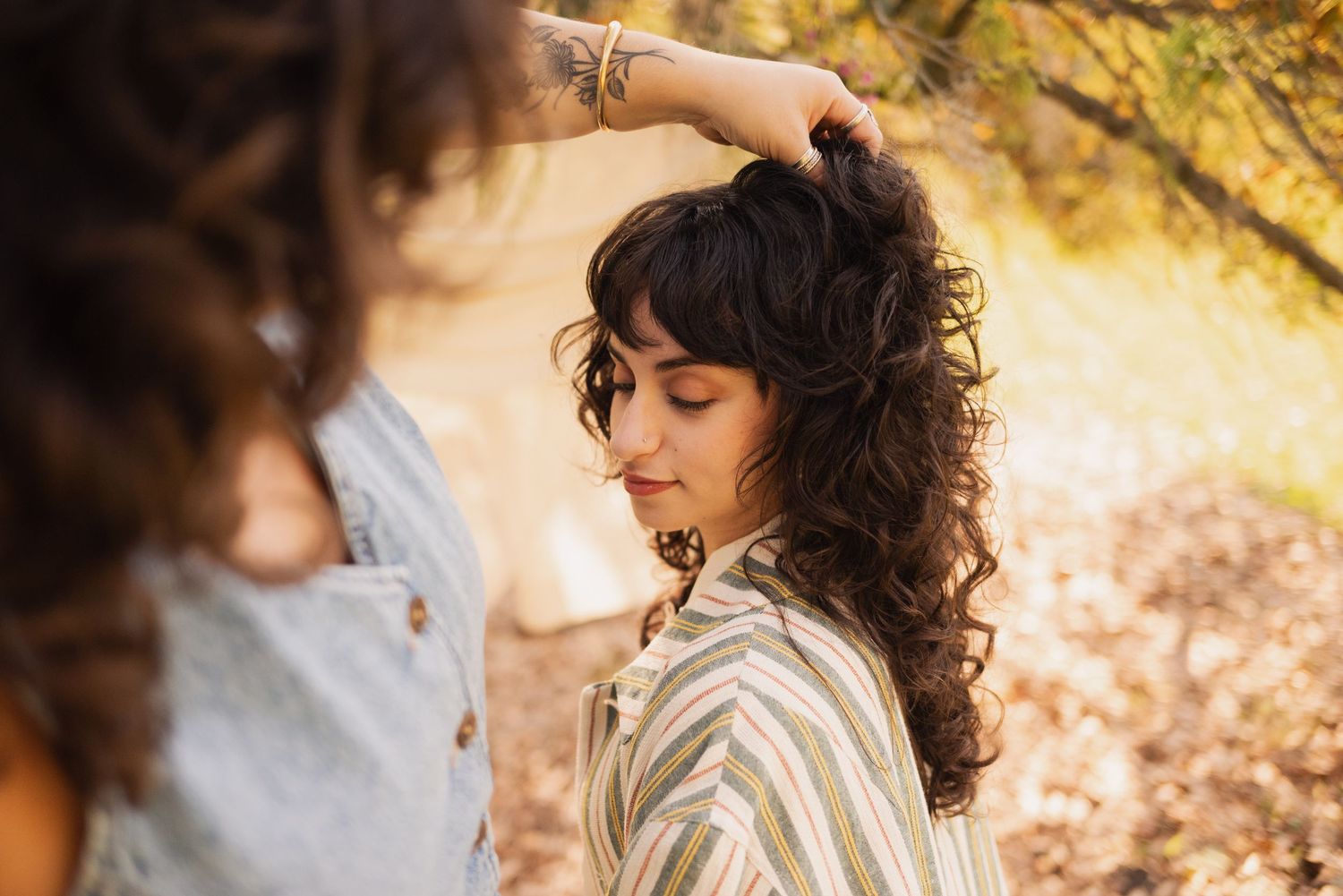 Artistic portrait sequence captured in warm natural lighting under tree branches.