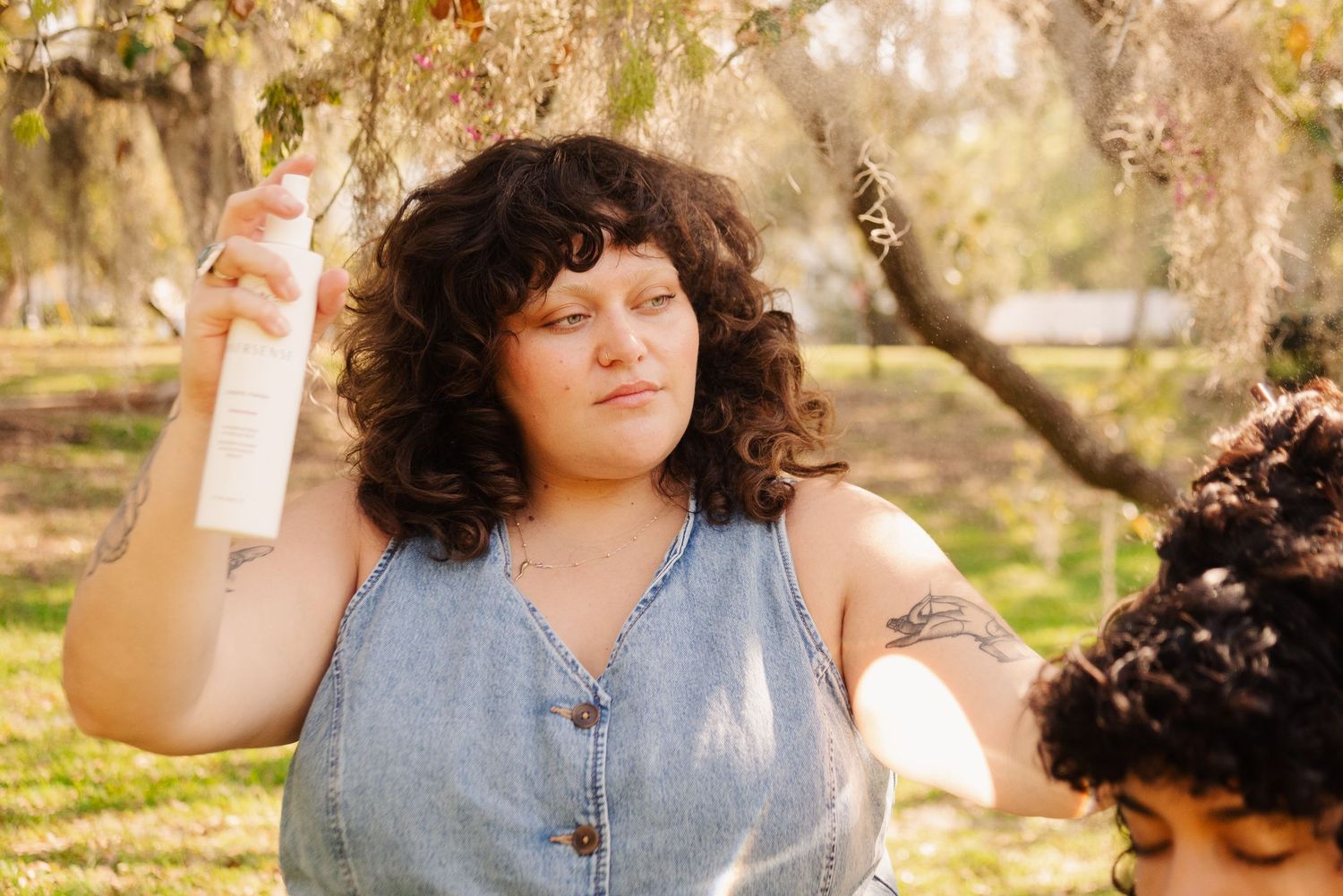 Multiple shots of someone in casual denim and green clothing posing outdoors in natural lighting.