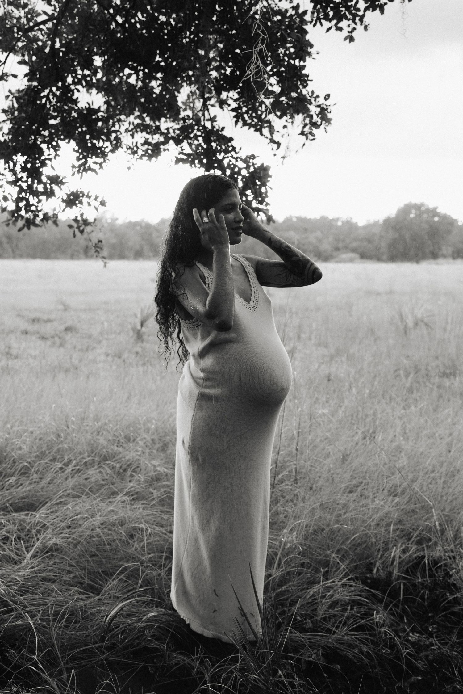Artistic black and white sequence showing movement in tall grass field.