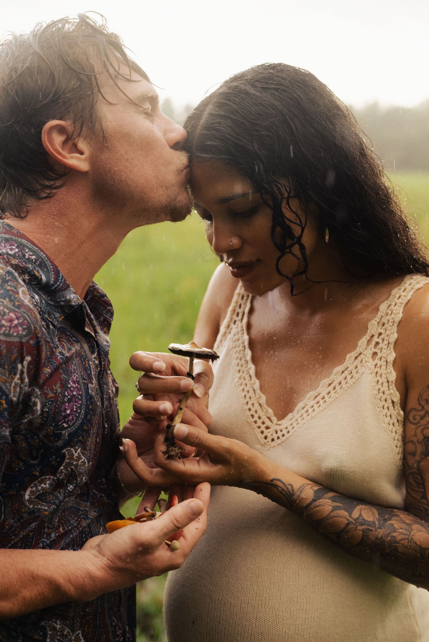 Close-up shots of two people sharing a tender moment outdoors.