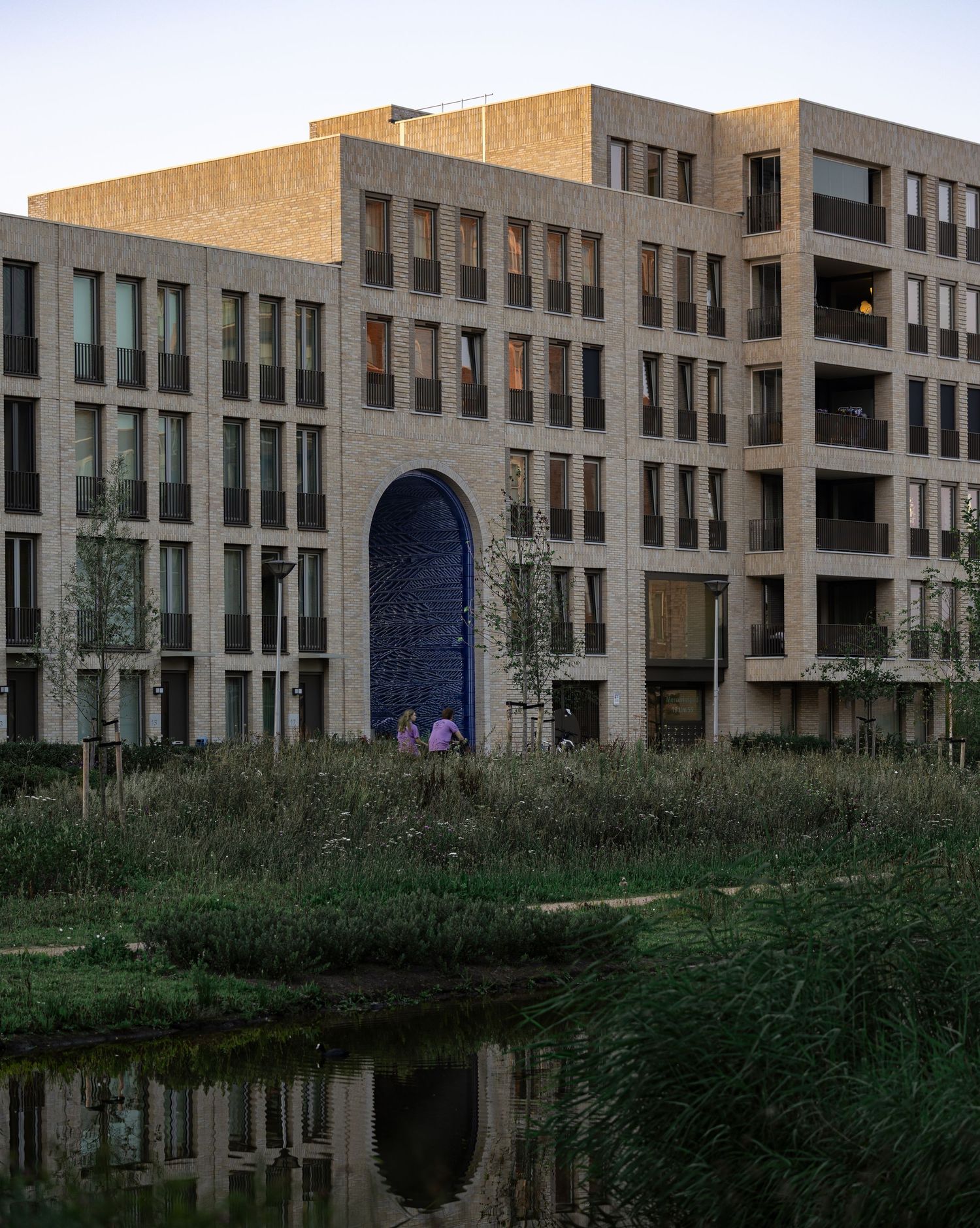 DELFT - Poortmeester sustainable gas-free housing project with natural vegetation and water recycling features.