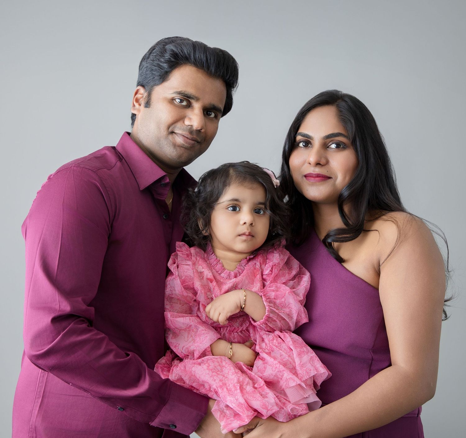 Family of three photographed in a studio portrait session near Monroe, WA