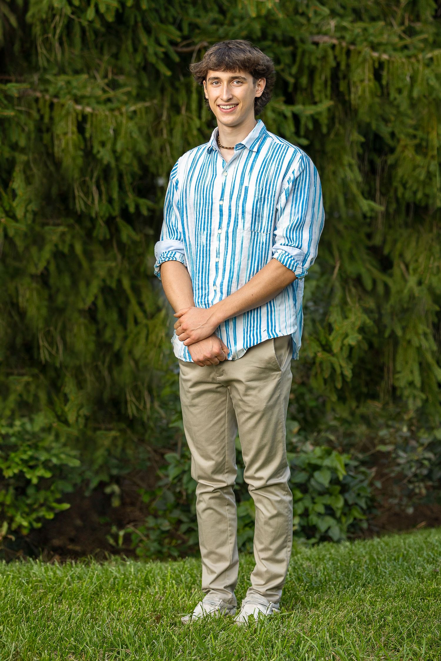 A happy senior during a golden hour photography session.