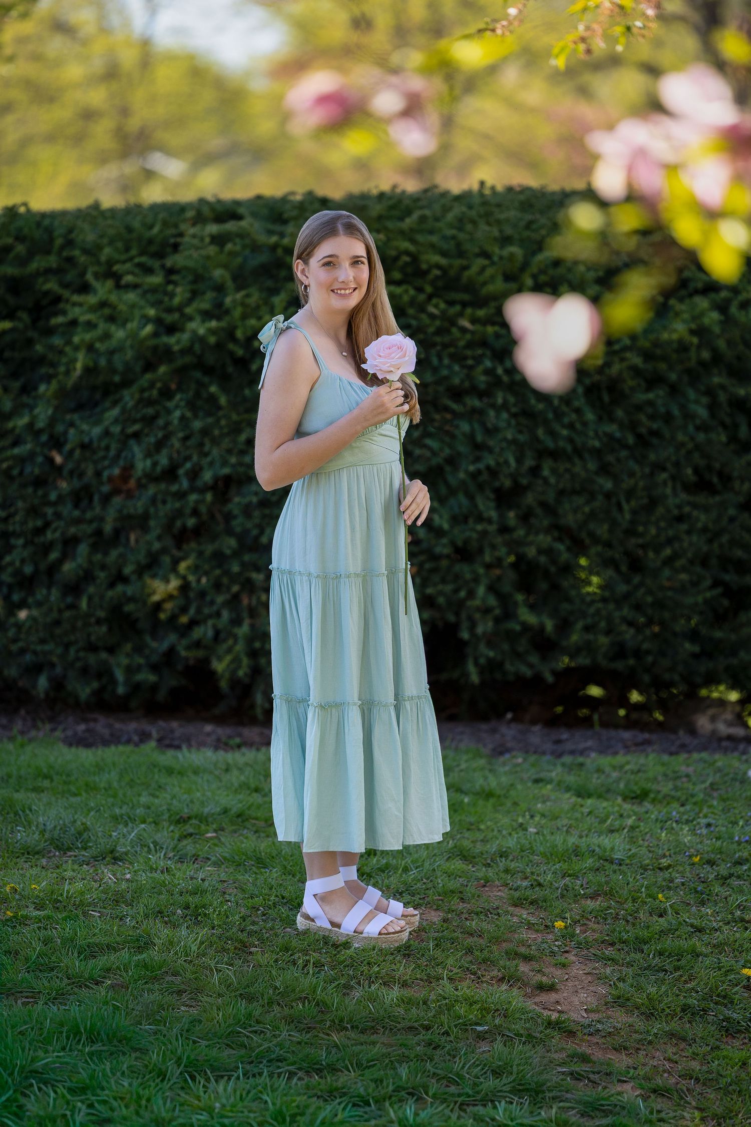 A happy senior during a golden hour photography session.