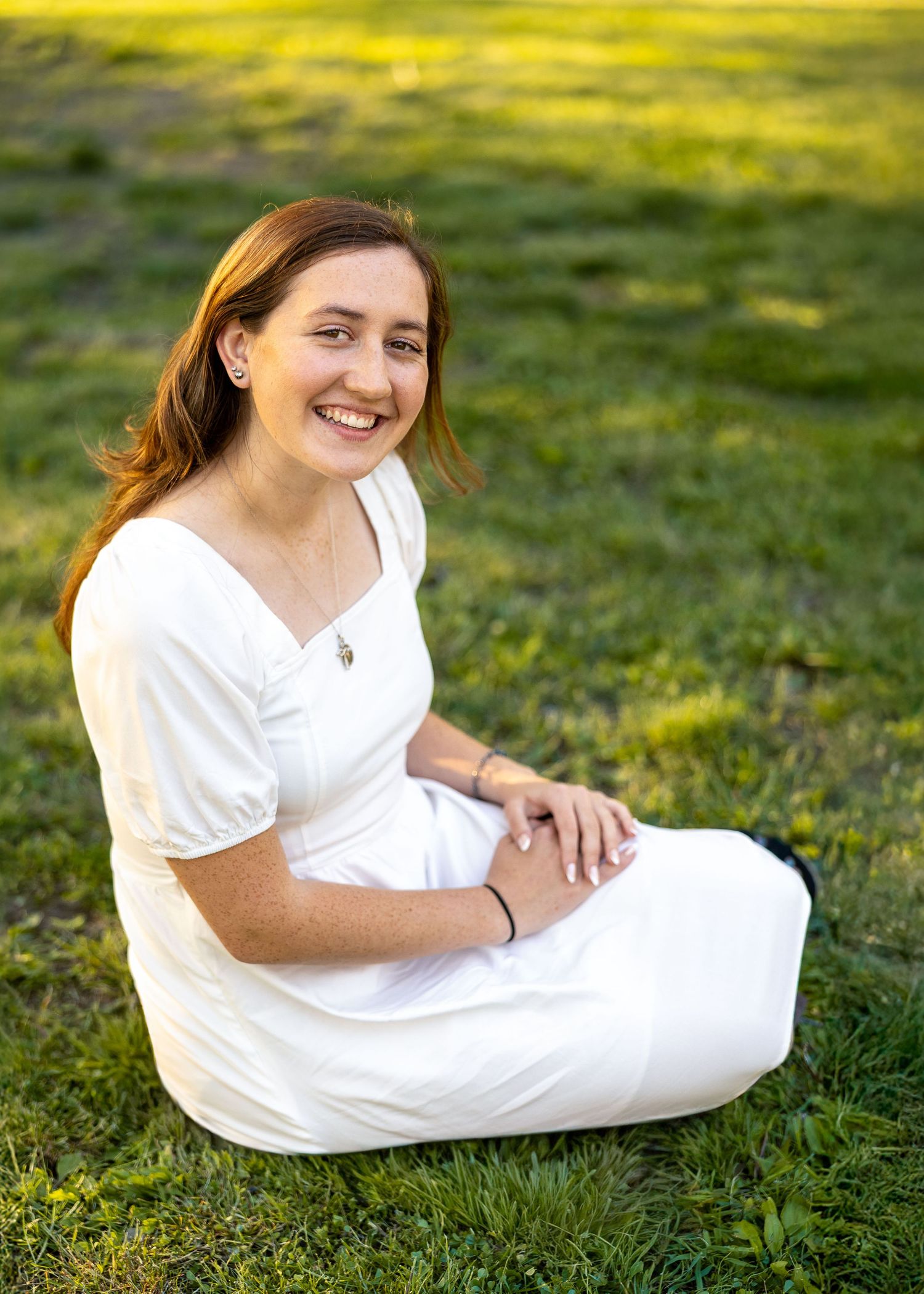 A happy senior during a golden hour photography session.