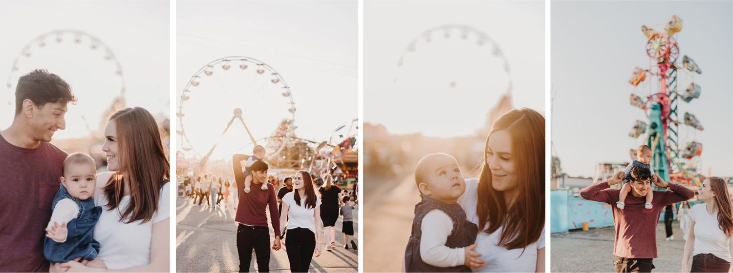 A young couple holding hands and walking through a crowded fairground with a Ferris wheel in the background at sunset.
