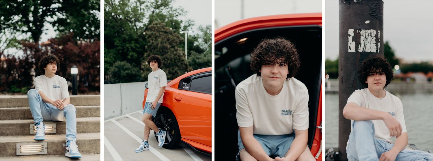 A young man with curly dark hair standing next to an orange sports car, white T-shirt, light blue shorts, and sneakers for senior photos.