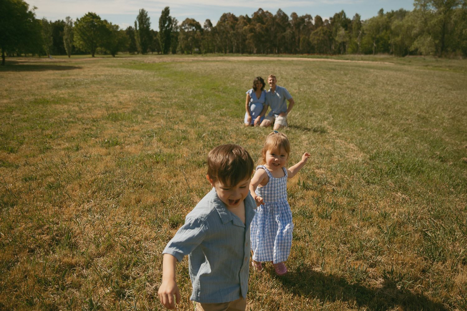 Children playing together during an outdoor family session