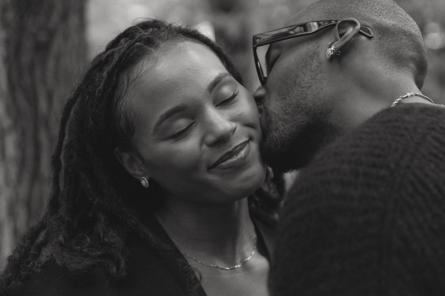 Family embracing together during a relaxed lifestyle photography session