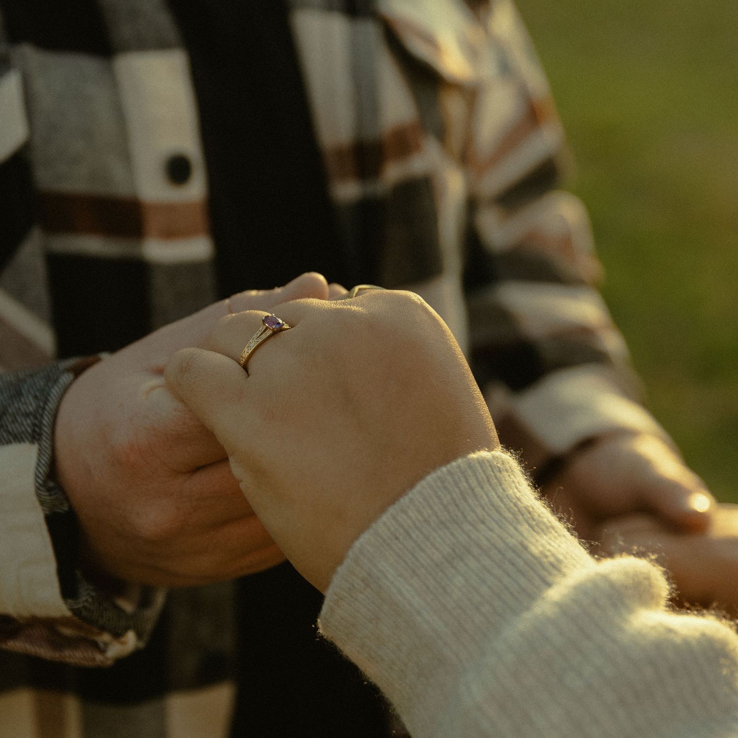 Couple enjoying a picnic together during an outdoor engagement session