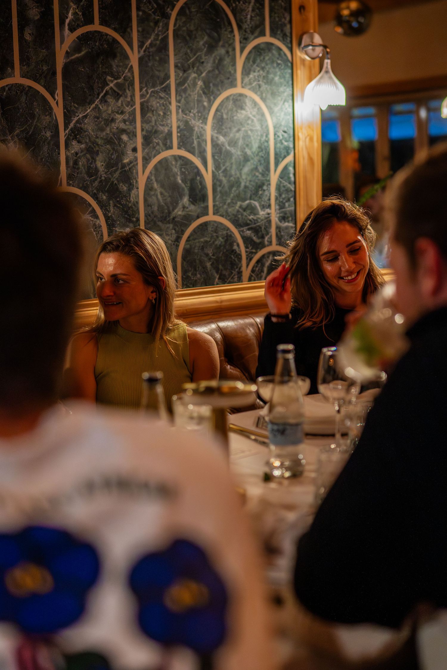 Guests enjoying an evening dinner event at a Cape Town restaurant, captured through candid lifestyle and event photography.