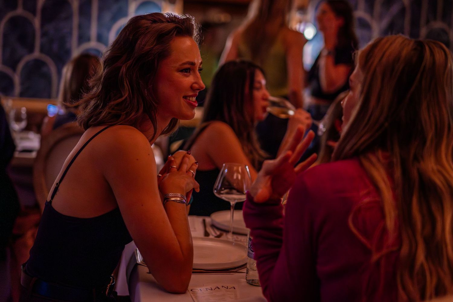 Guests socialising during an evening restaurant event in Cape Town, captured through candid nightlife and event photography.