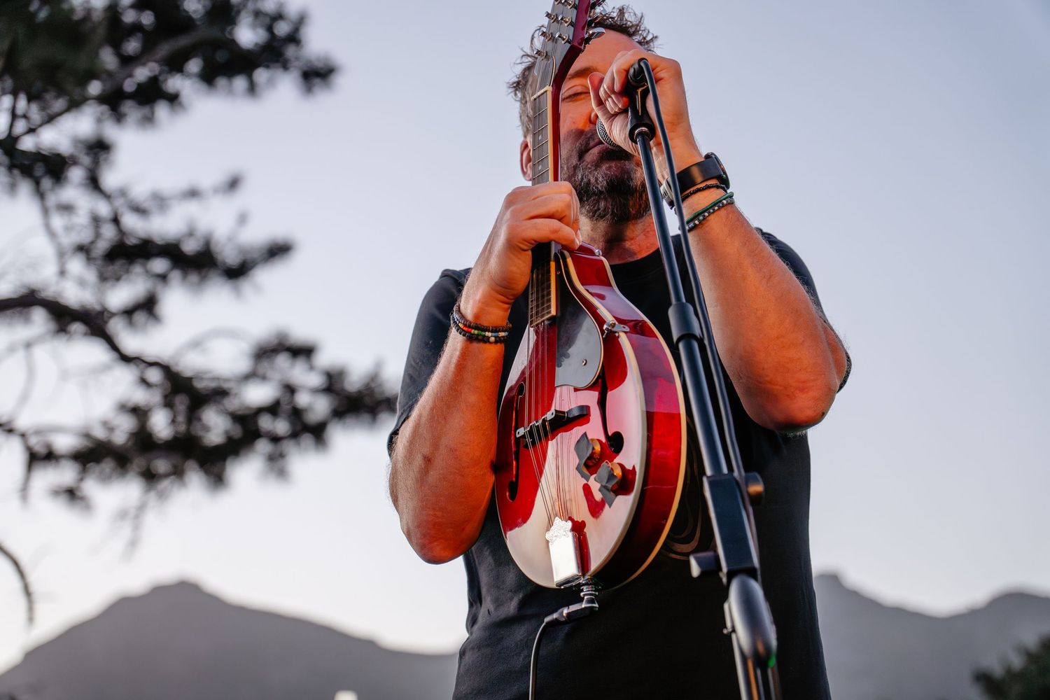 Watershed musician performing live on stage at Cape Point Vineyards, captured through concert photography in Cape Town.