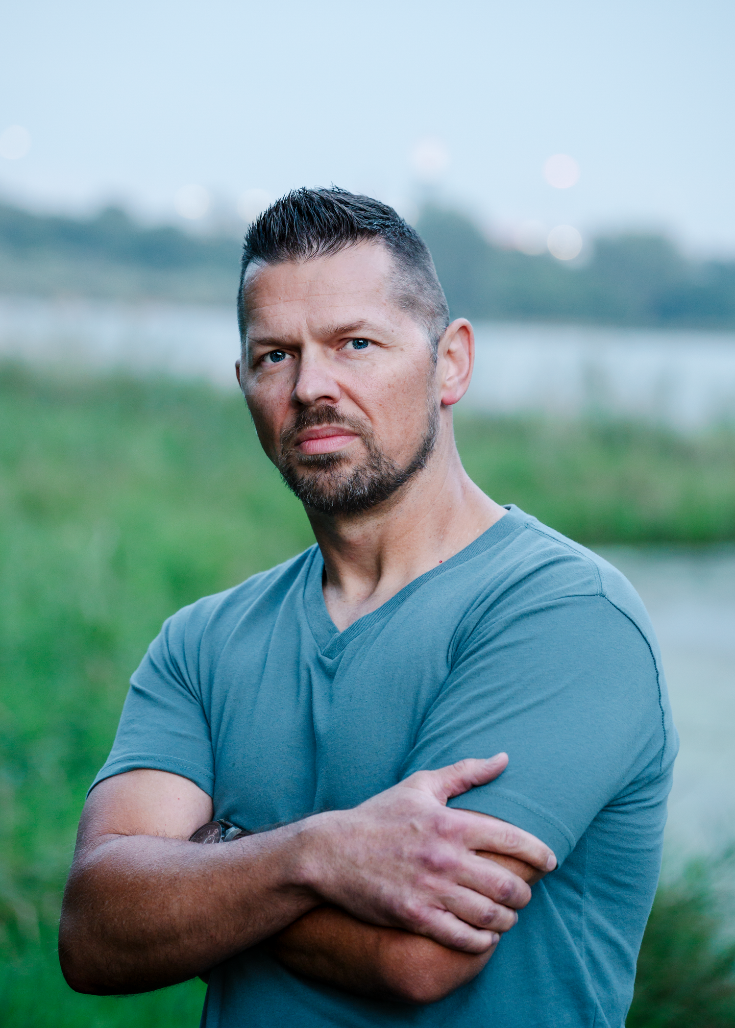 Outdoor individual portrait of a man at Chalco Hills Recreation Area in Omaha