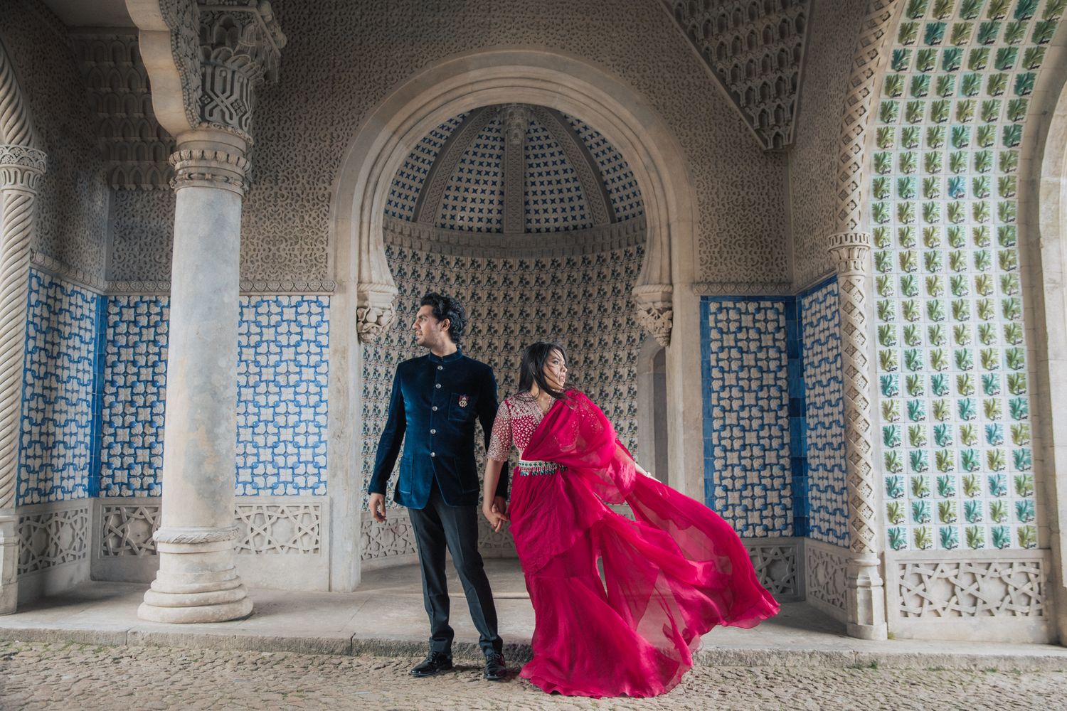 Destination engagement shoot with Indian couple at a palace in Lisbon, Portugal, blending cultural flair and architecture