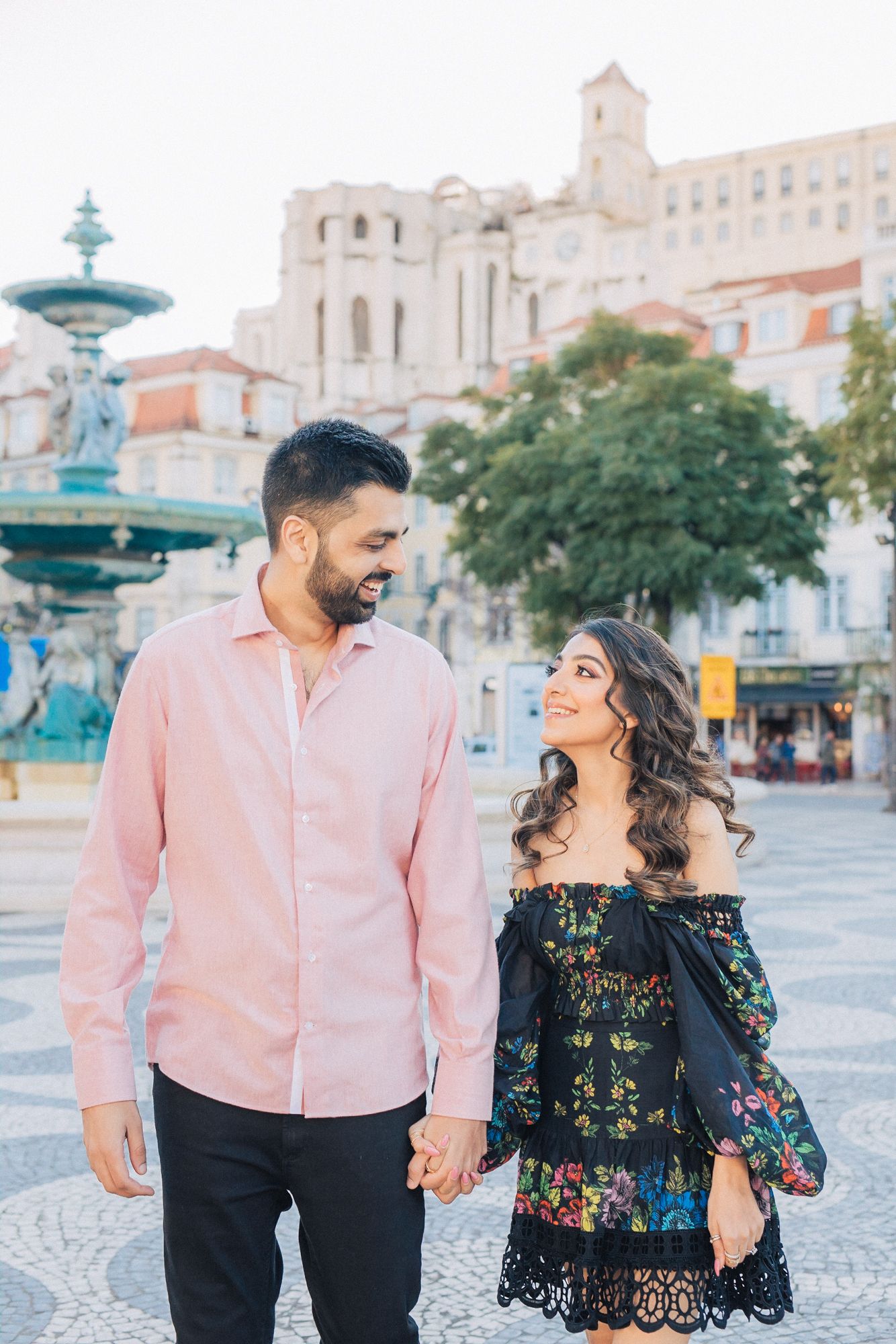 Romantic engagement photoshoot of an indian couple at the historical city of Lisbon during a Destination Wedding in Portugal