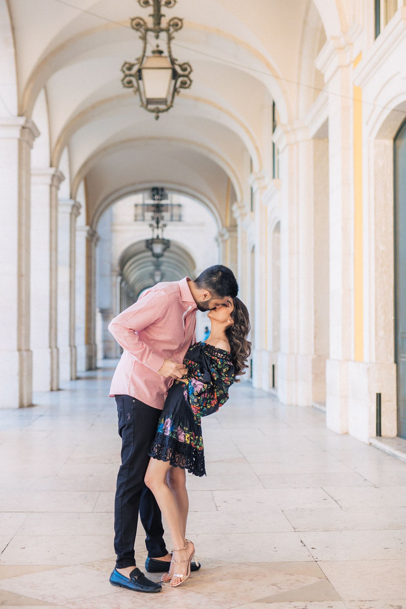Romantic engagement photoshoot of an indian couple at the historical city of Lisbon during a Destination Wedding in Portugal